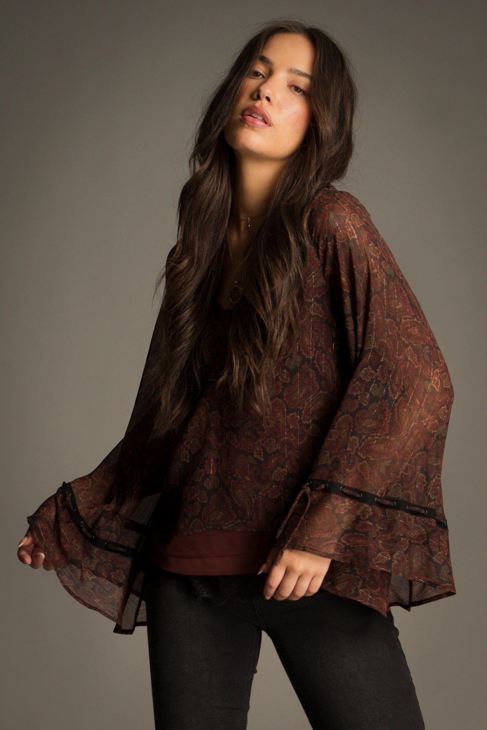 Dark Paradise Paisley Boho Top showing relaxed boxy fit and dramatic flared sleeves.