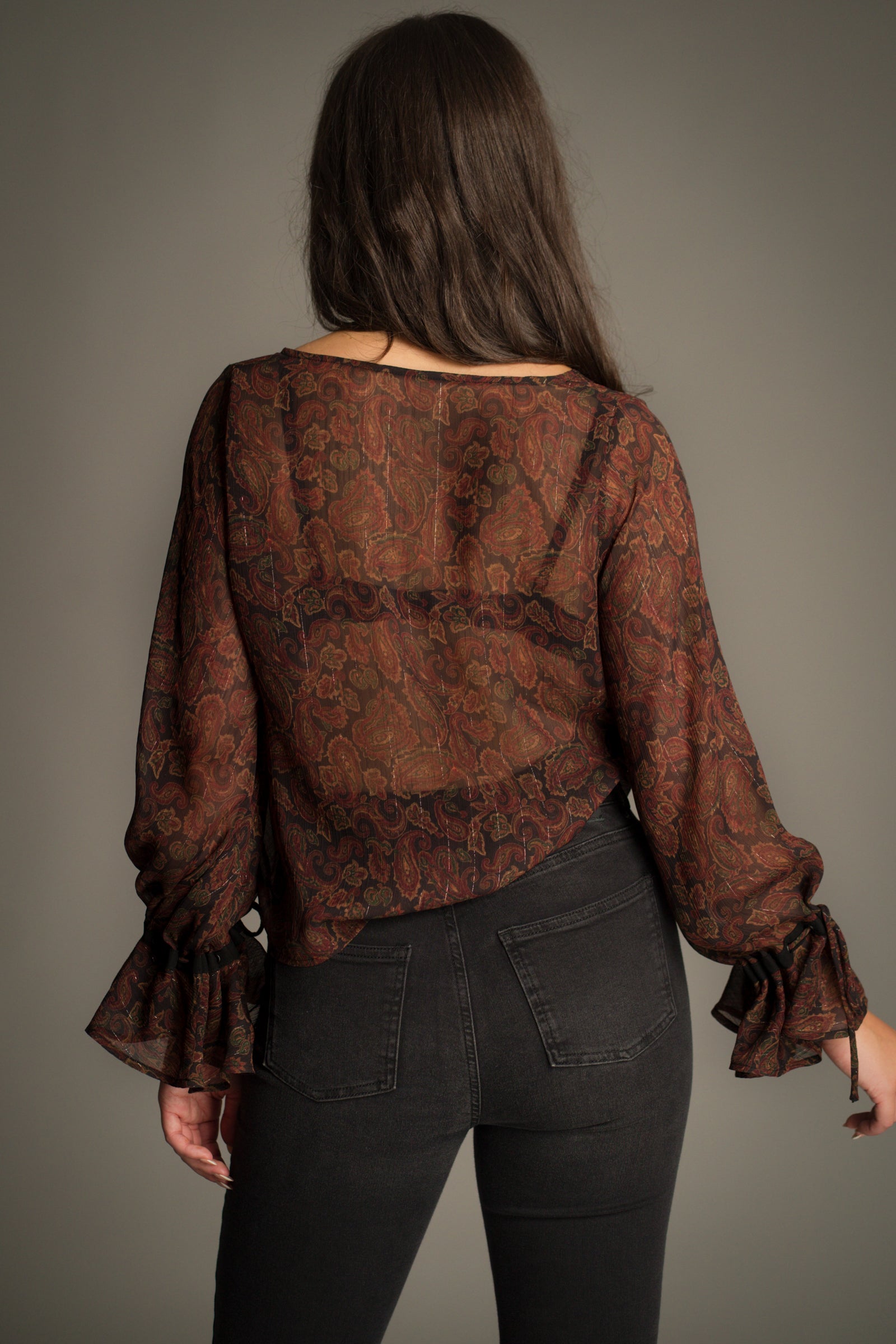 Back view of the Dark Paradise Paisley Boho Top in sheer jewel-toned paisley chiffon.