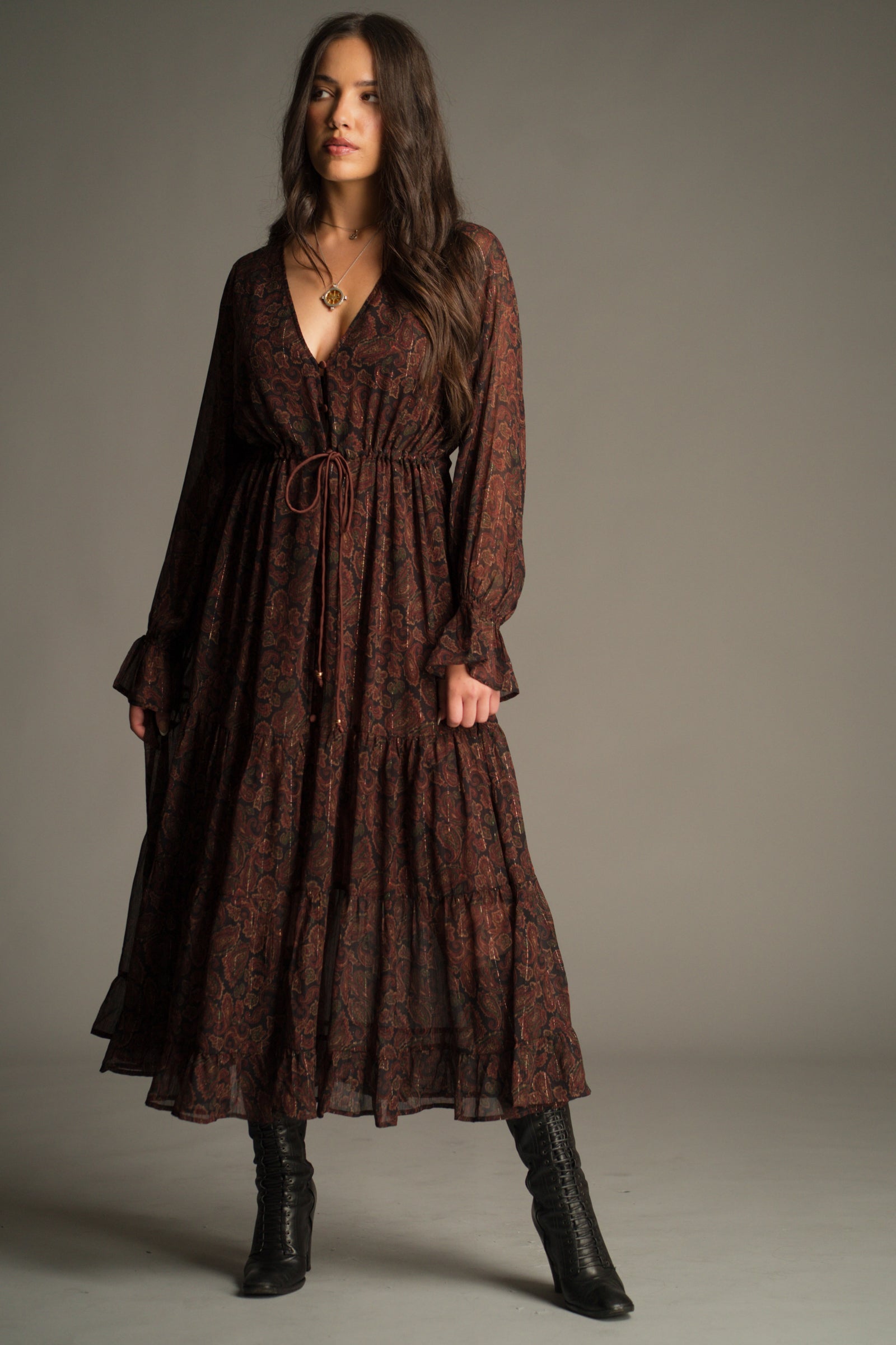 Full length back view of the Dark Paradise Paisley Maxi Dress in jewel-toned paisley chiffon.