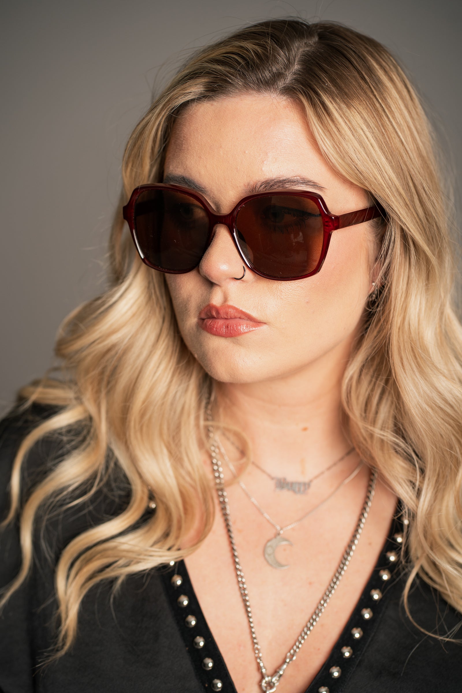 Little Lies Diana crimson red retro sunglasses with oversized square frame and tinted lenses