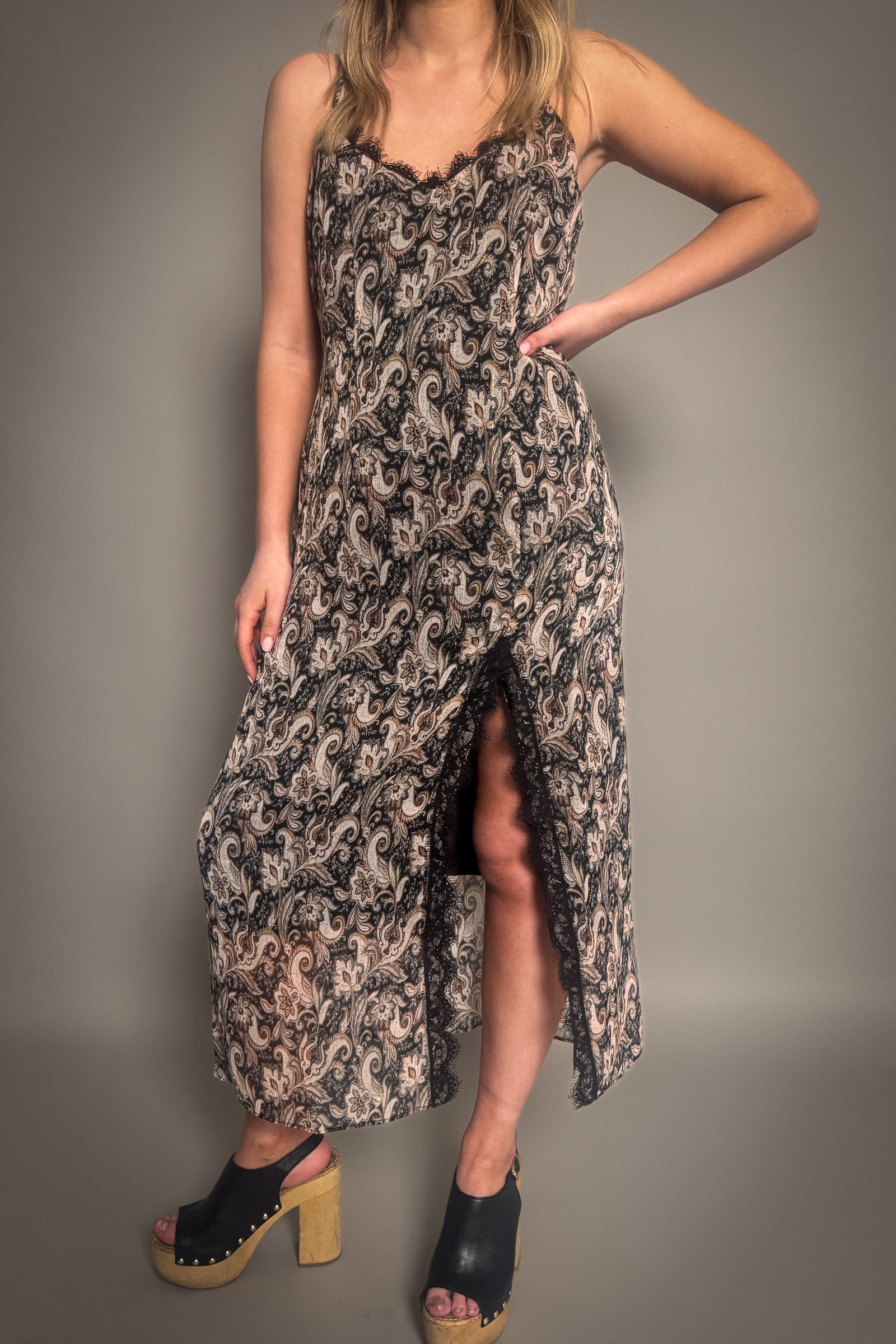 Little Lies Eleanor Paisley Slip Dress styles with black shoes. Lace trim, side split and paisley print.