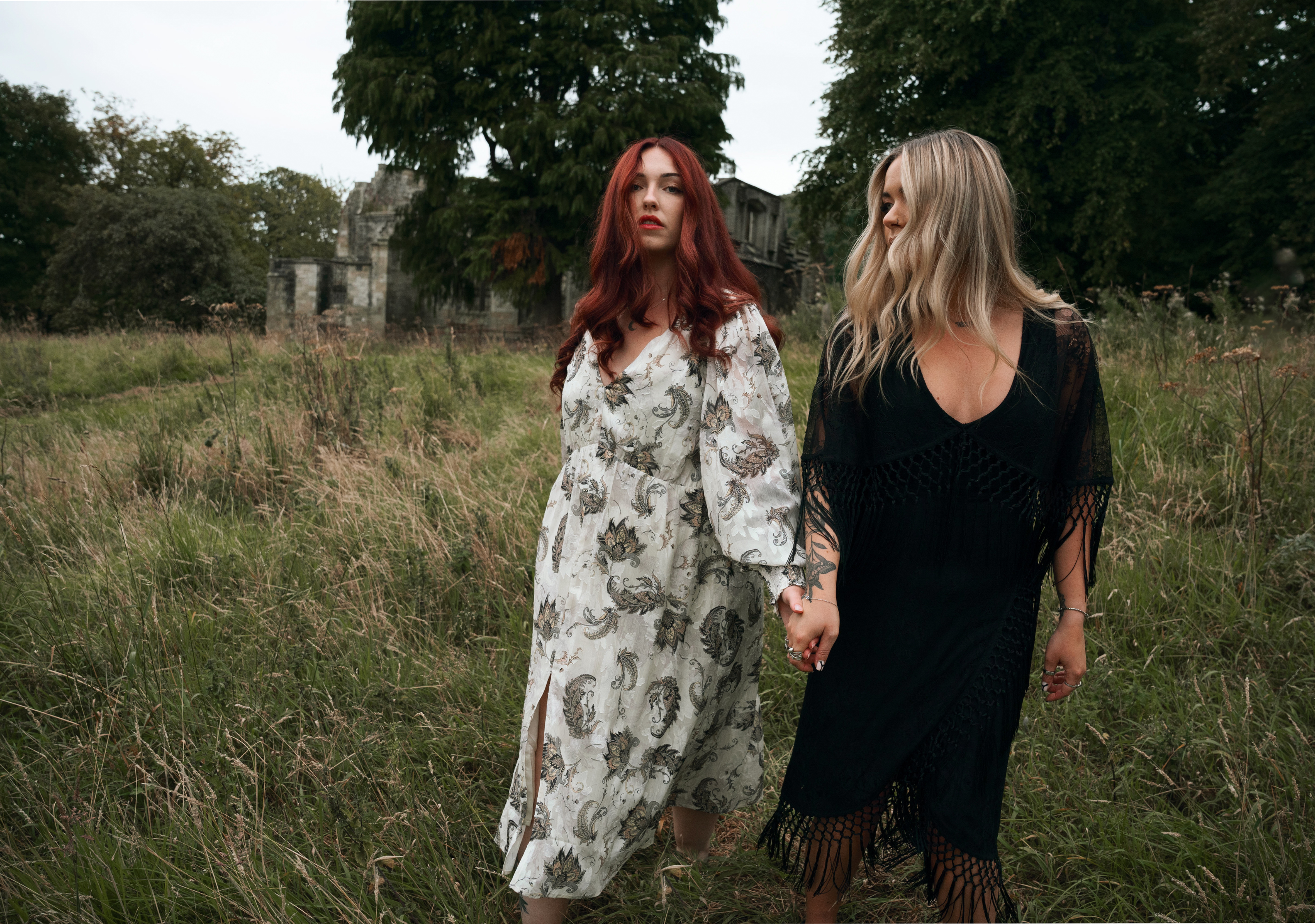 Erin wears Tango in the Night Lace Midi Dress, Taylor wears Harvest Moon Paisley Midi Dress on Stevie Nicks inspired shoot.