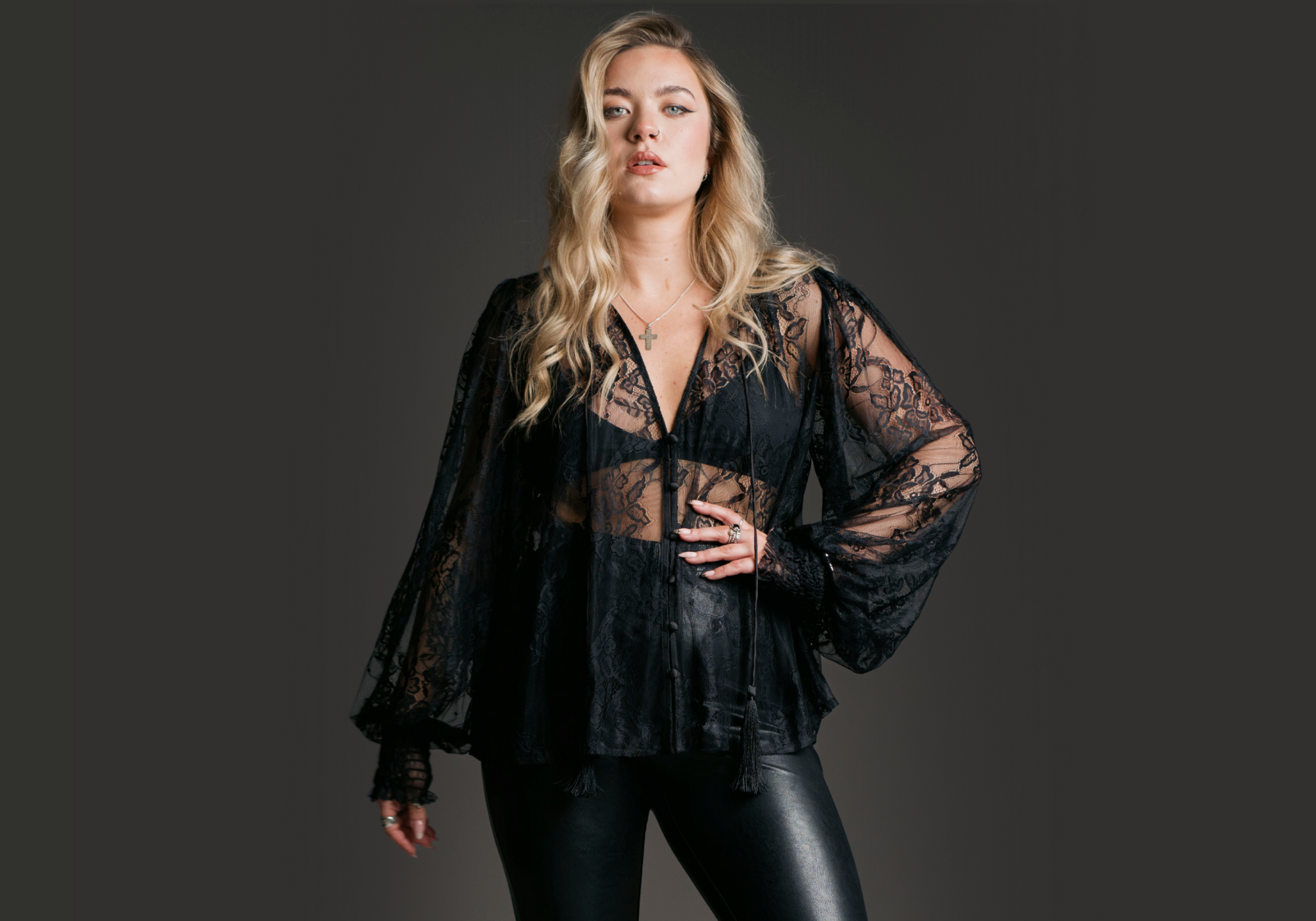 Erin wearing Rhiannon lace smock top and Hendrix black Faux Leather Flares