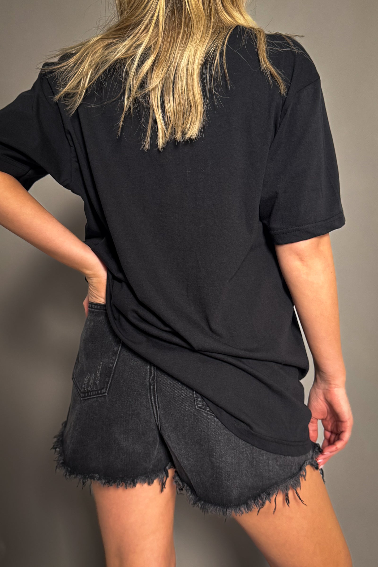 Back view of the Fleetwood Mac Circle Logo band t-shirt in black.