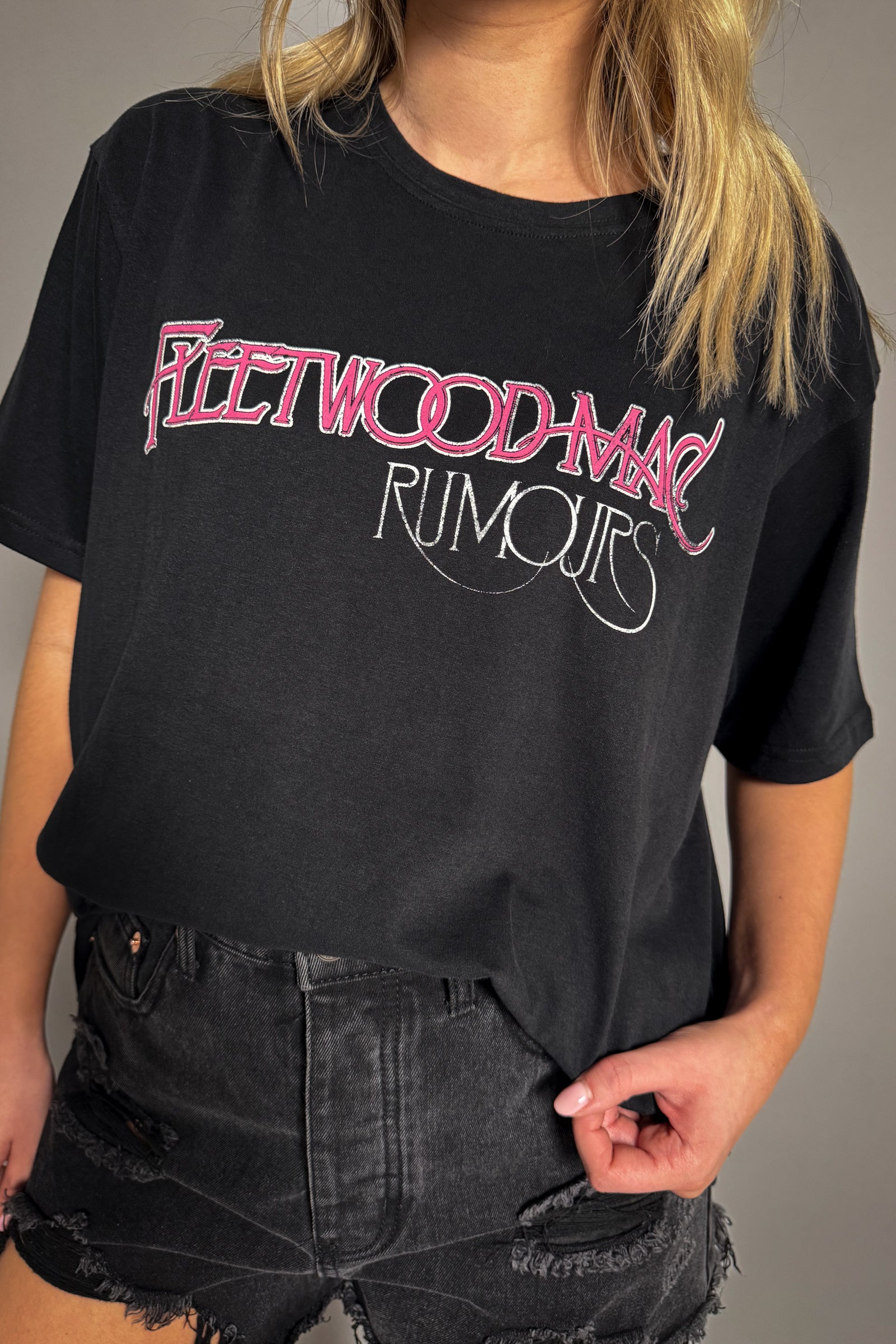 Side view of the Fleetwood Mac Retro Rumours band t-shirt in black.