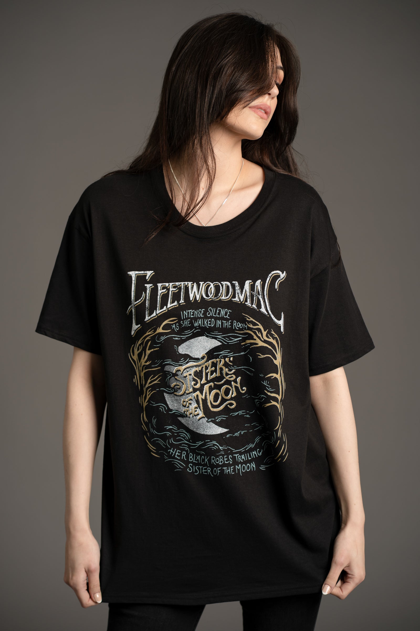 Model Andie wearing the Fleetwood Mac Sisters of the Moon Band graphic tee styled with Hendrix denim flares from Little Lies