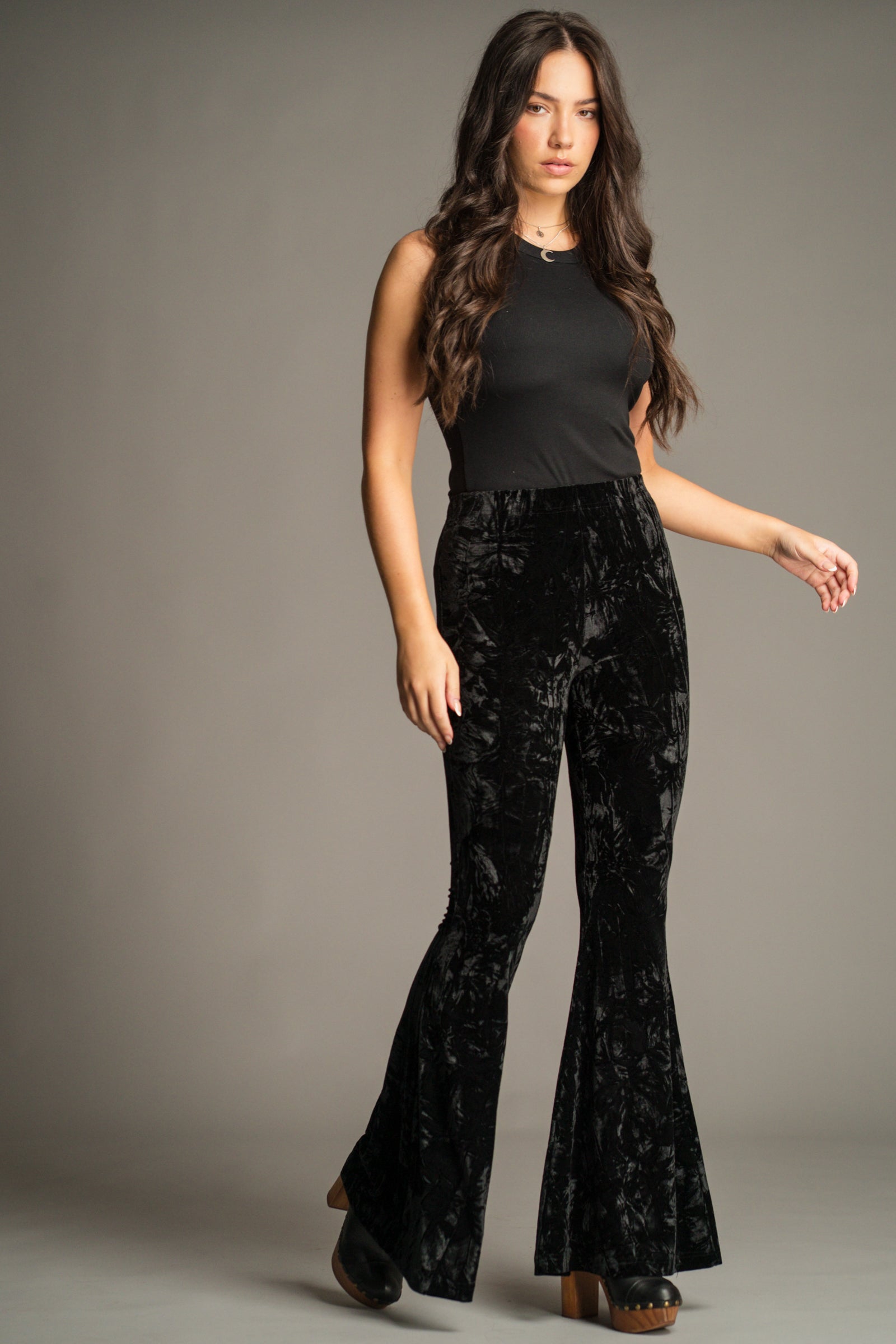 Front view of the Hendrix Black Crushed Velvet Flares in lustrous black velvet.