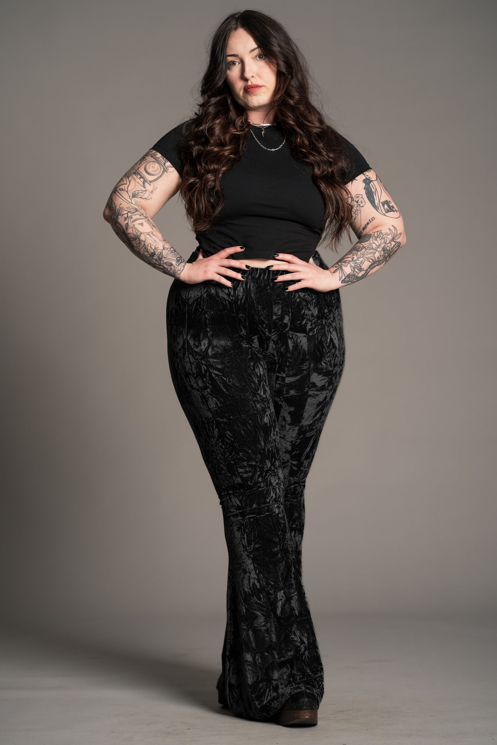 Plus size front view of the Hendrix Black Crushed Velvet Flares in lustrous black velvet.