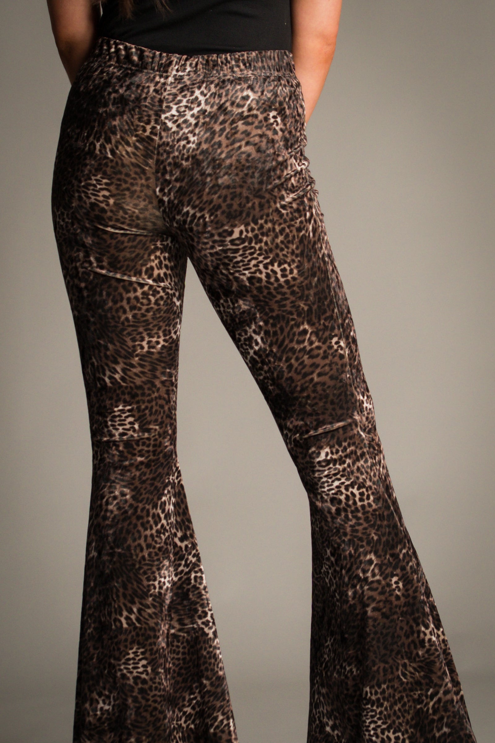 Close-up back detail of the Hendrix Leopard Velvet Flares showing leopard print velvet texture.