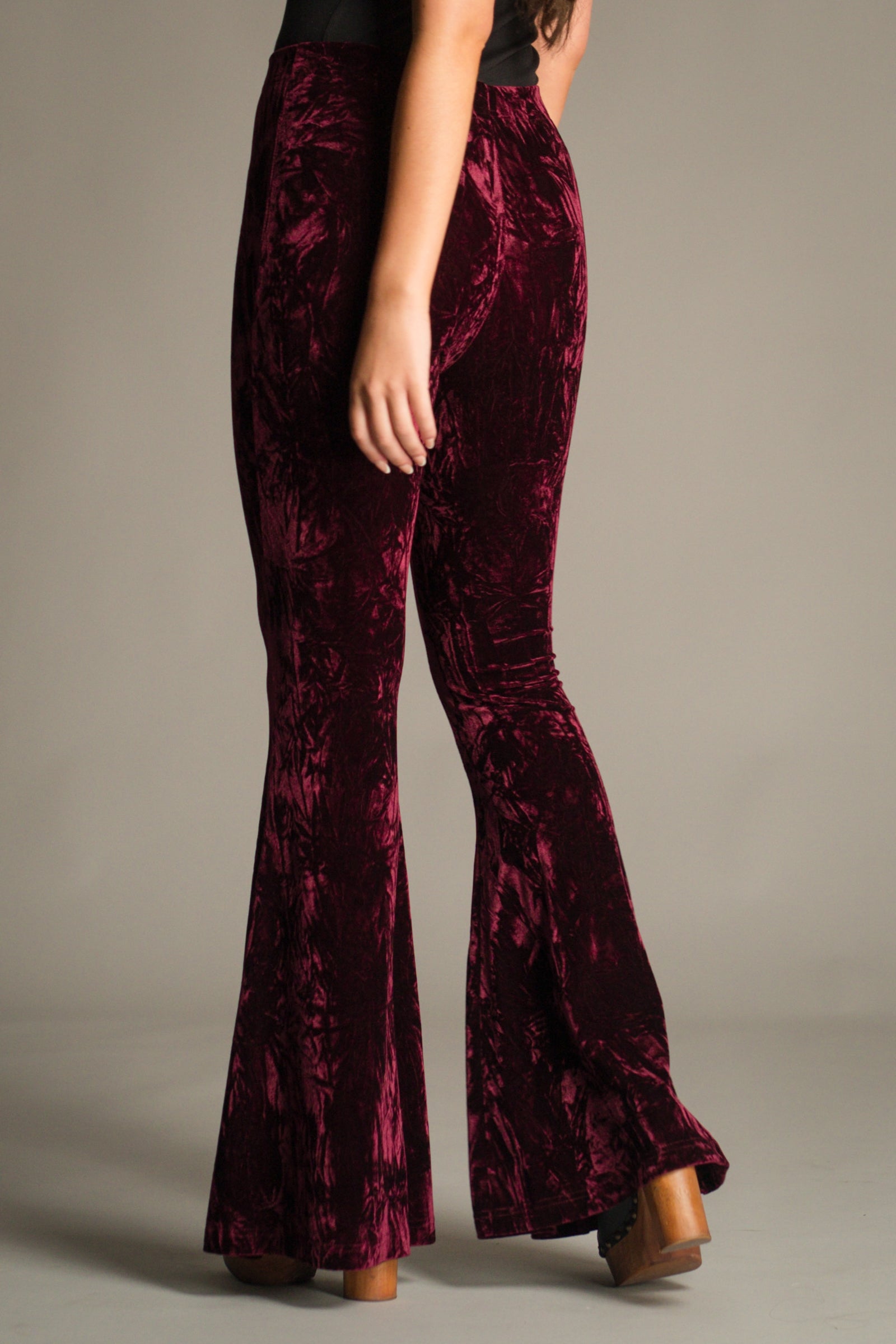 Close-up back detail of the Hendrix Merlot Crushed Velvet Flares showing crushed velvet texture.