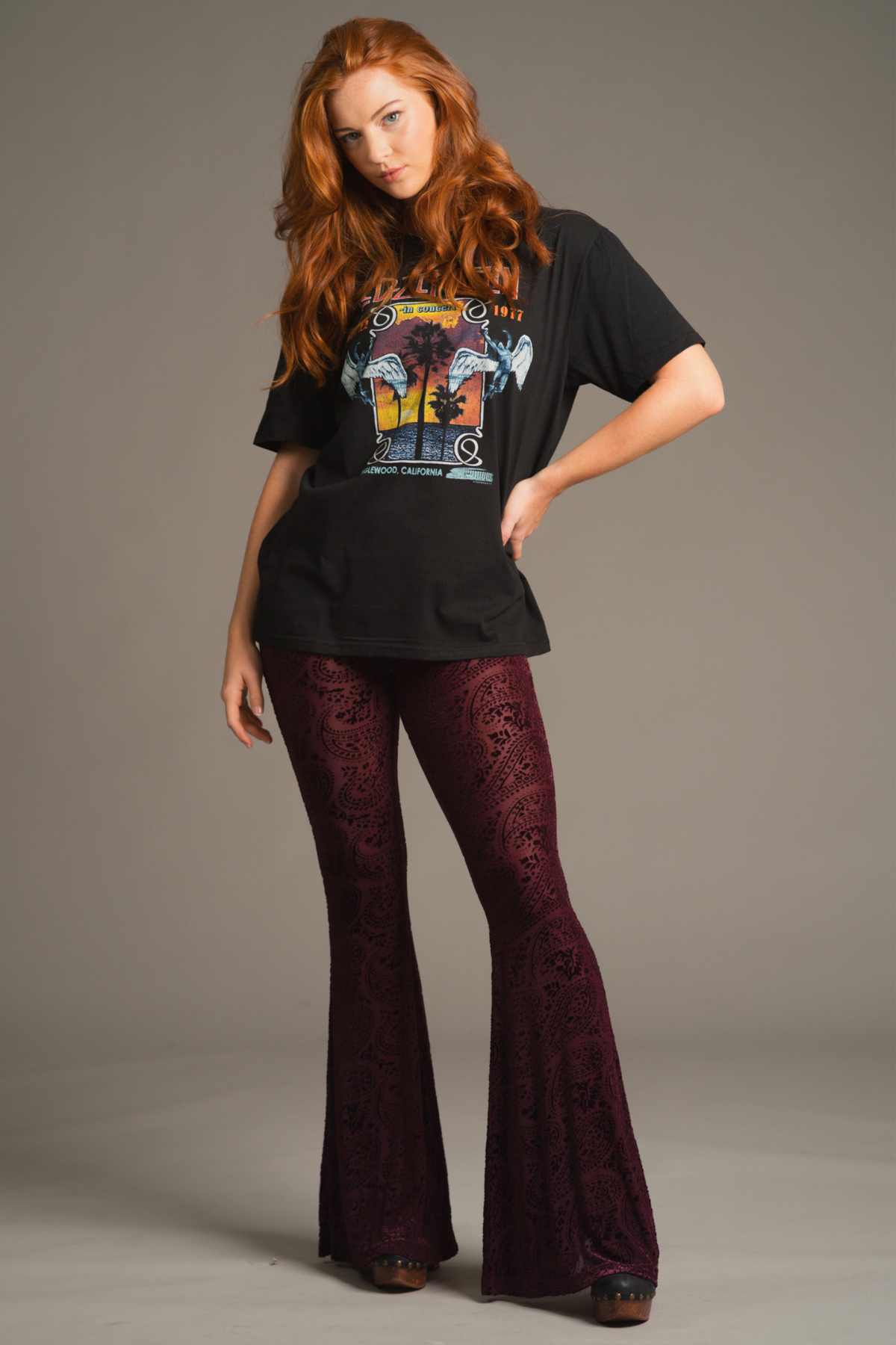 Anna wearing 70s inspired outfit featuring Hendrix Plum devore flares and Led Zeppelin Band Tee. Rock n Roll Style