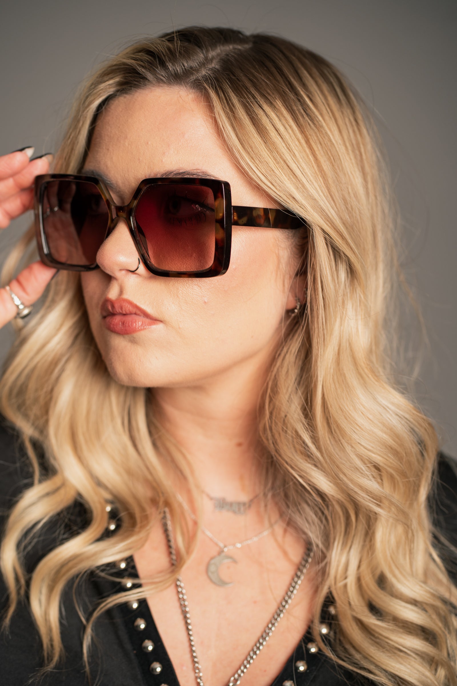 Side profile of Little Lies Jerry Oversized Square Sunglasses in tortoiseshell showing bold square silhouette