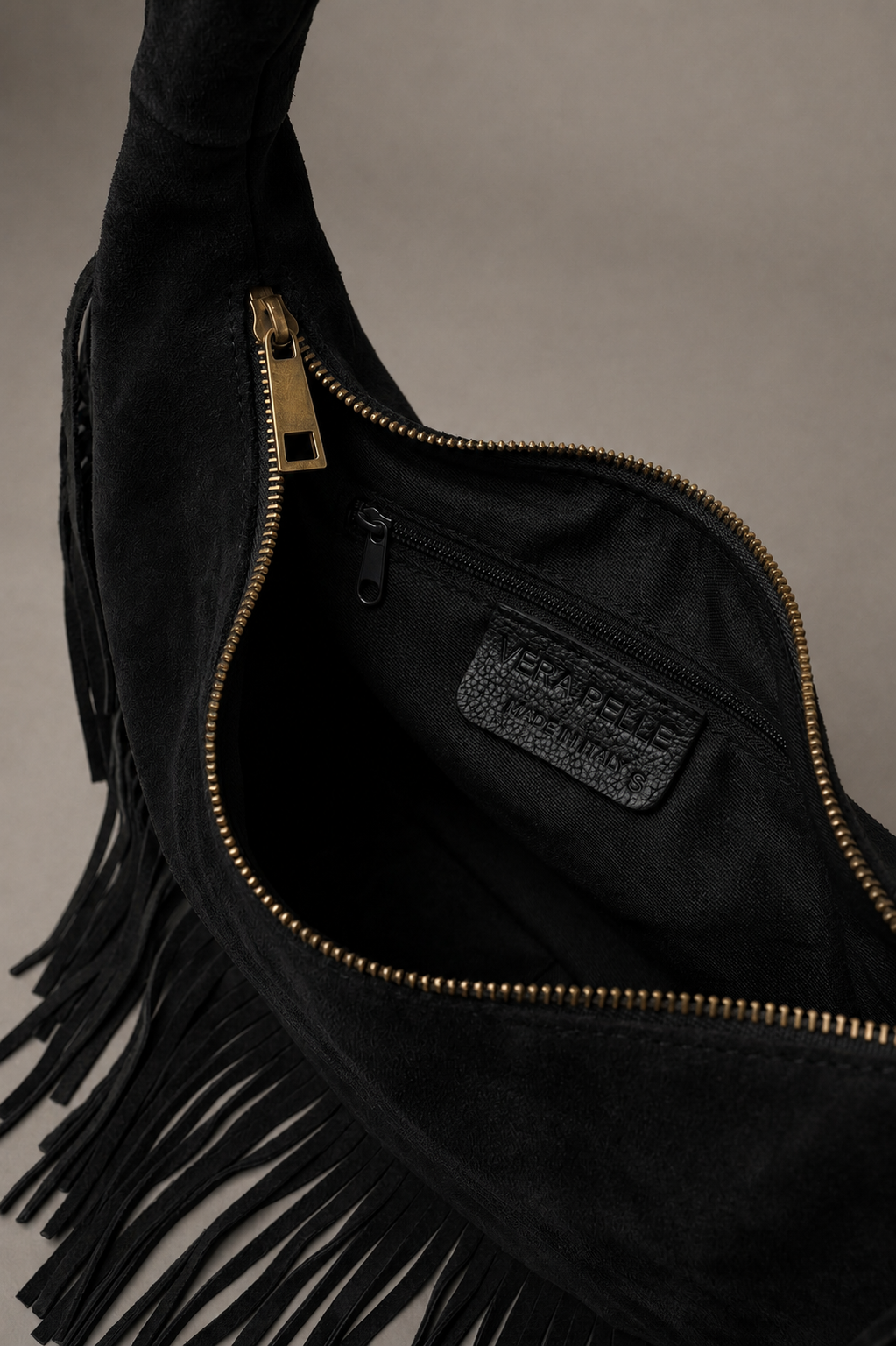 Little Lies Kate black genuine suede studded fringe bag with zip closure and inner pocket, interior detail view
