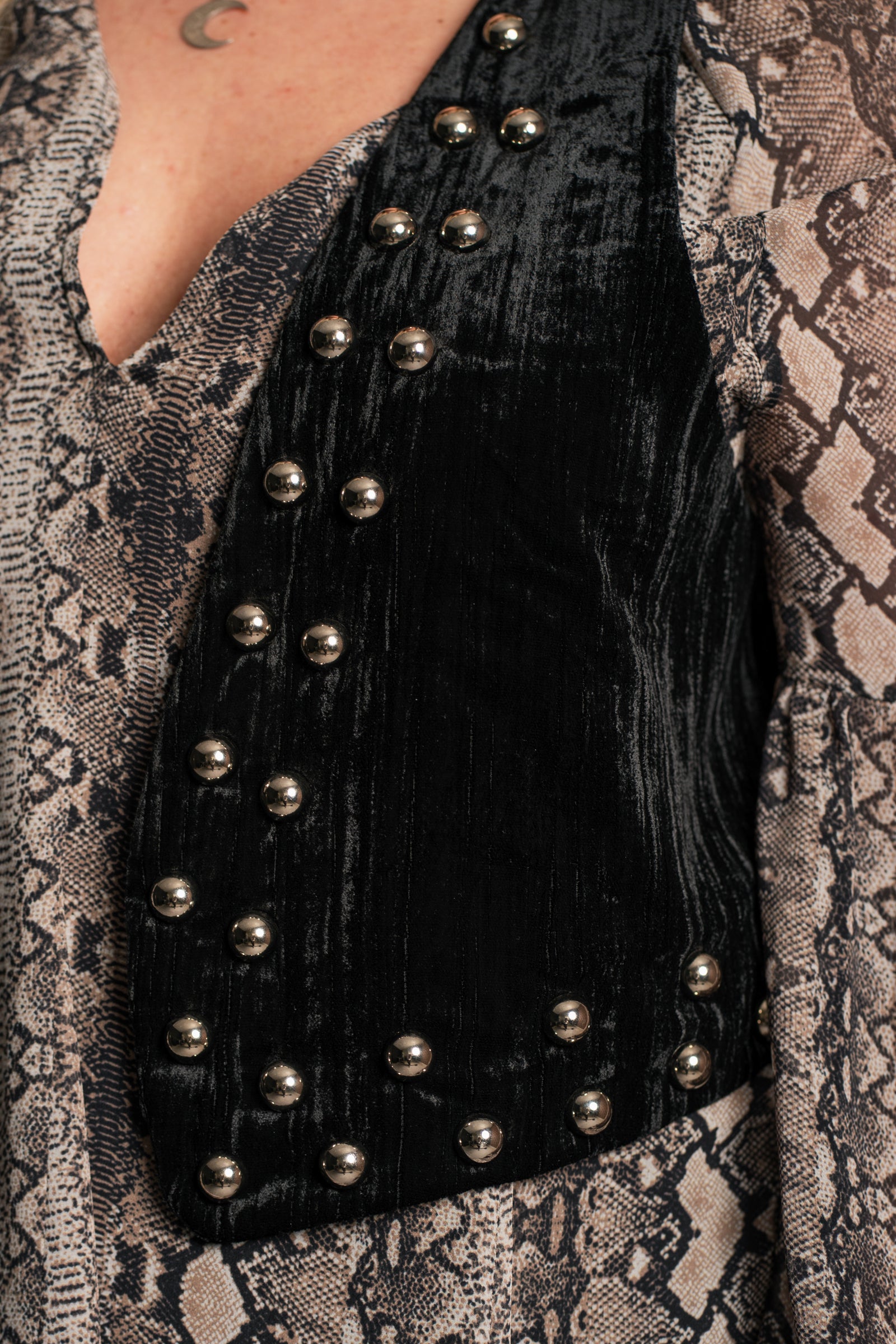 Close-up of Little Lies Lennon velvet waistcoat showing soft black textured fabric and silver stud embellishment