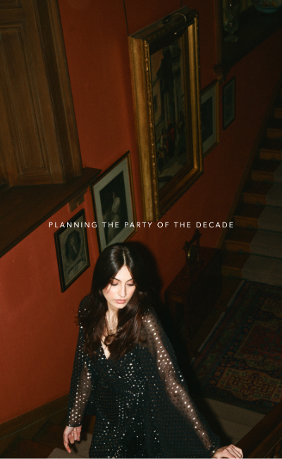 Model wearing Cosmic Dancer Metallic Wrap Dress. 