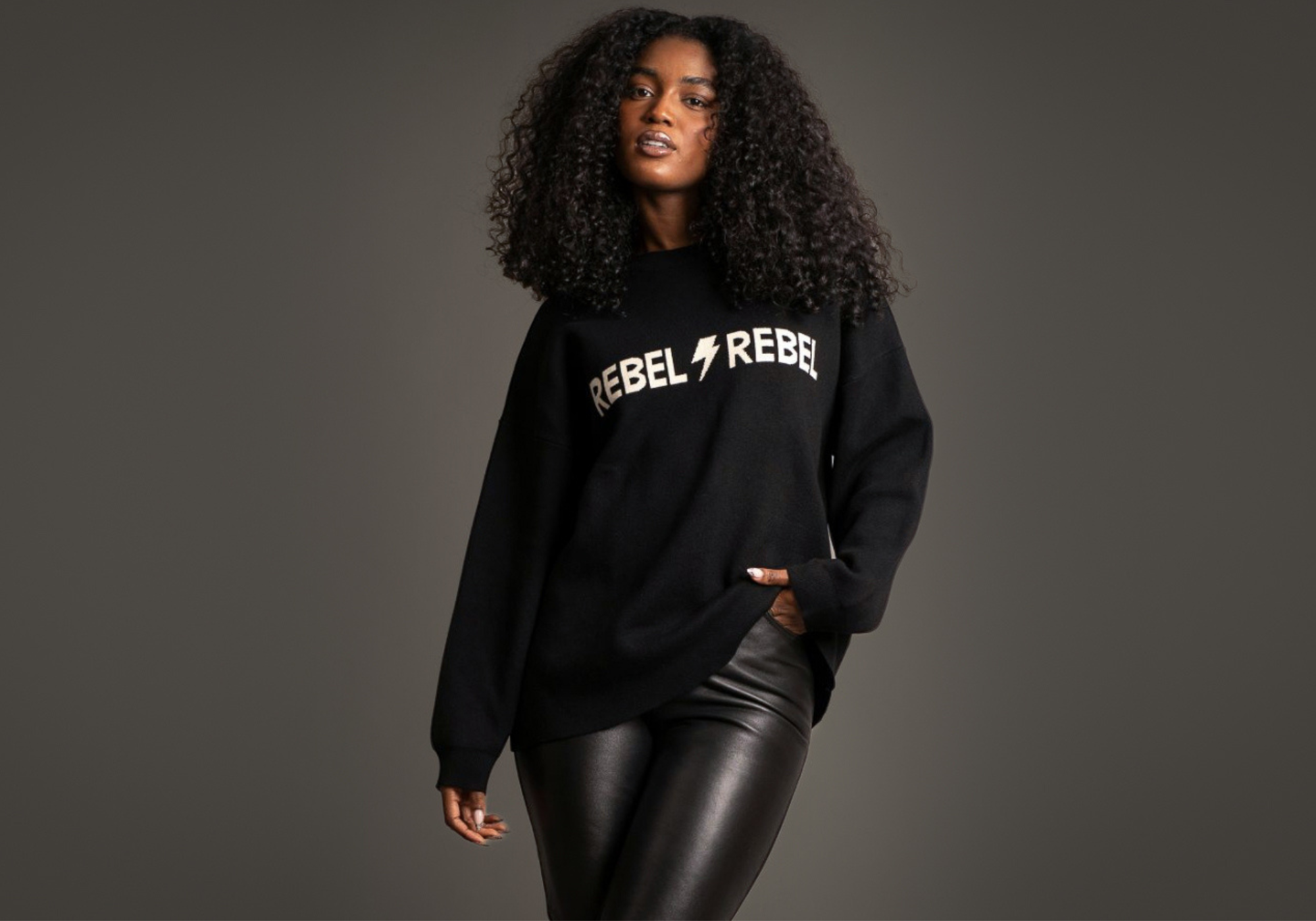 Mia Wearing Rebel Rebel Black Knit Jumper and Hendrix  Black Faux Leather Flares