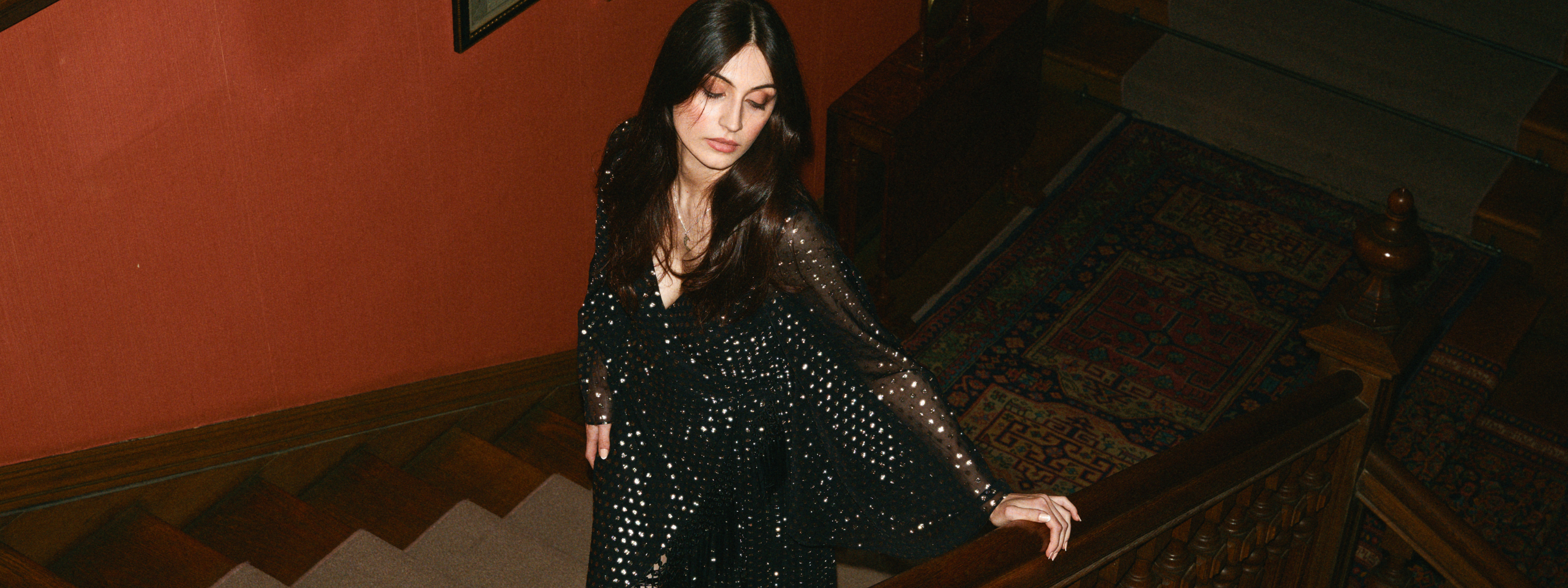 Model wearing Cosmic Dancer Metallic Wrap Dress on Party Collection shoot 