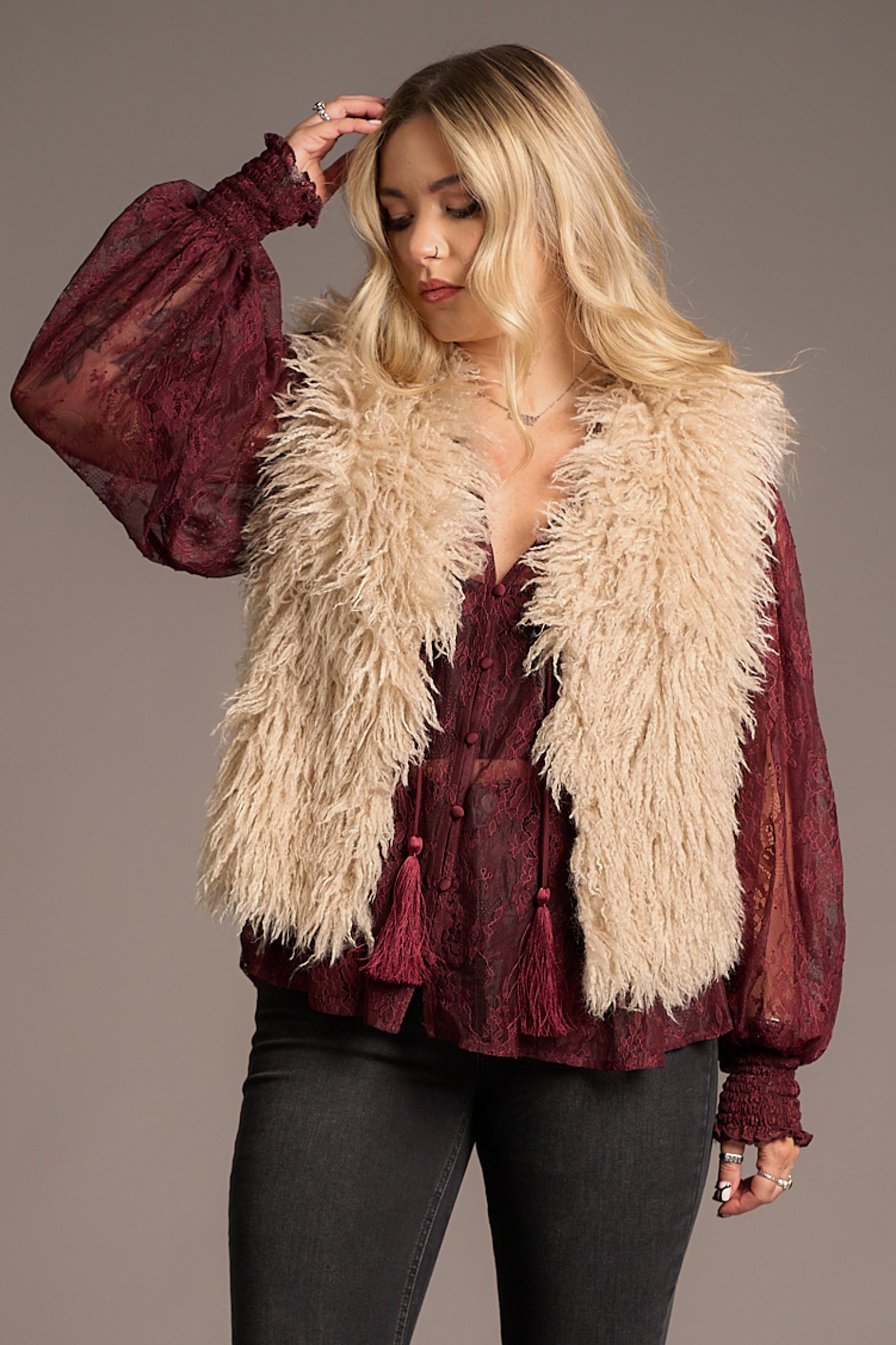 Erin wears cream Penny Lane Faux Mongolian Fur Gilet over burgundy lace blouse, Stevie Nicks inspired styling studio