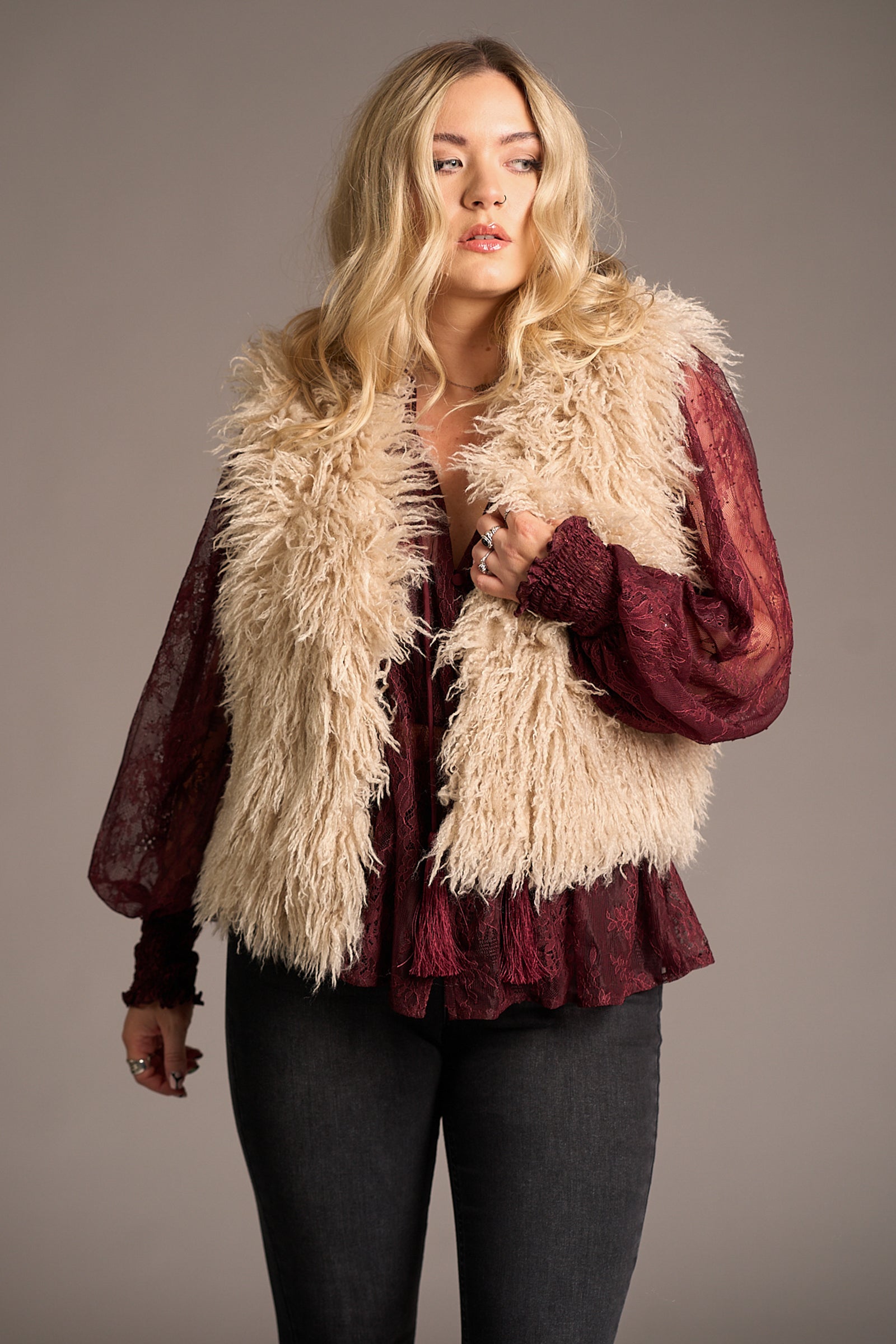 Erin wears cream Penny Lane Faux Mongolian Fur Gilet over burgundy lace blouse, Stevie Nicks inspired styling studio