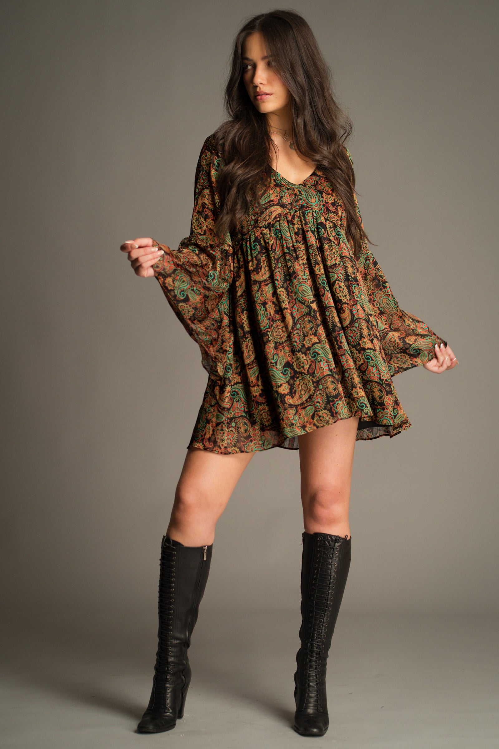 Little Lies Ringo Paisley Smock Dress styled with knee-high boots, showcasing a floaty silhouette and rich autumn paisley print
