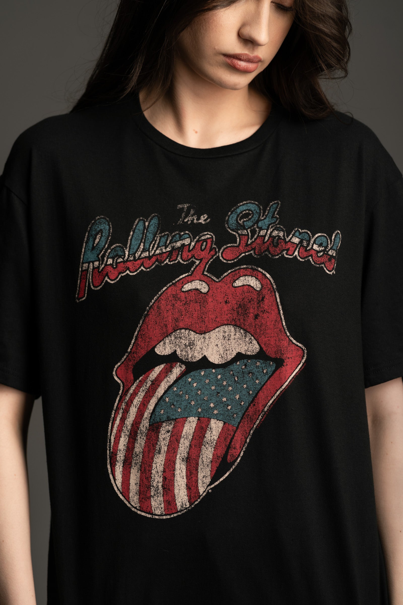 Close‑up of Little Lies The Rolling Stones '78 Tour Band Tee with vintage distressed lips and flag logo