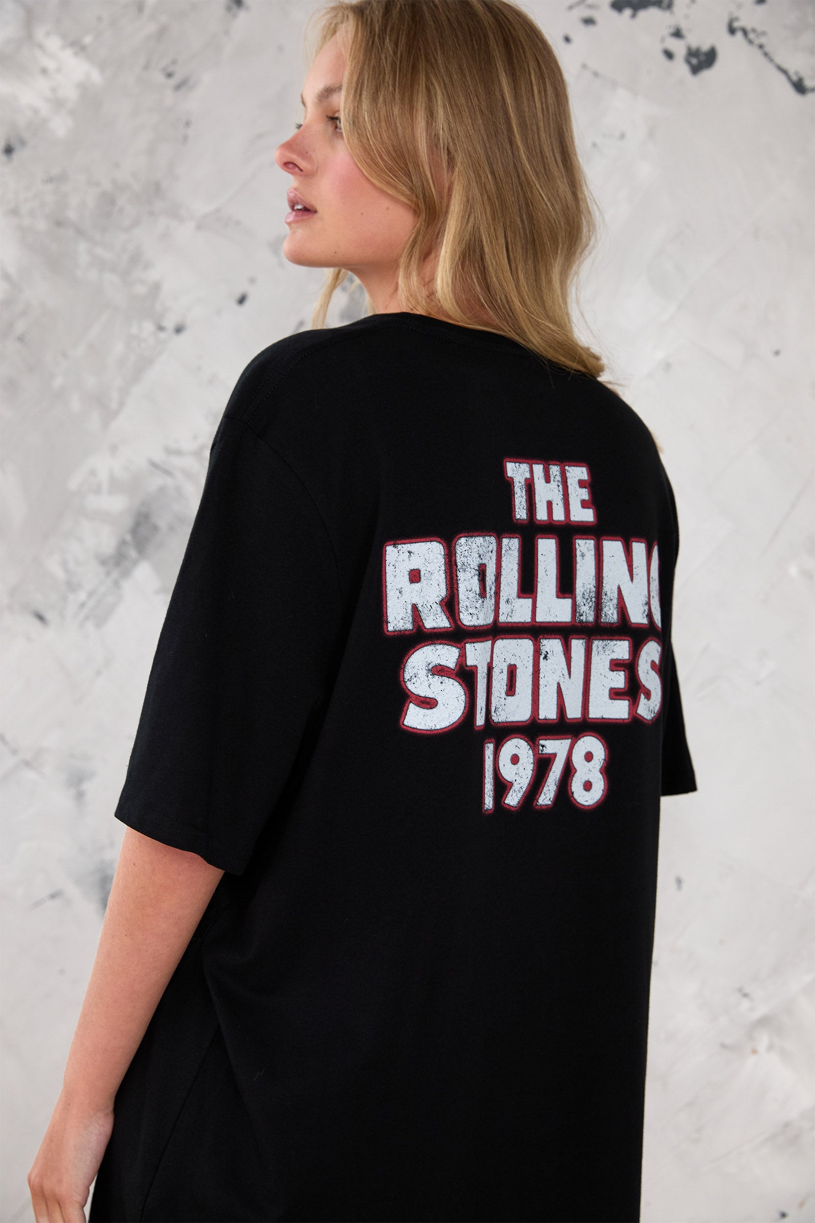 Back view of Little Lies Rolling Stones Dragon oversized black band-style t-shirt with Rolling Stones 1978 graphic on the back