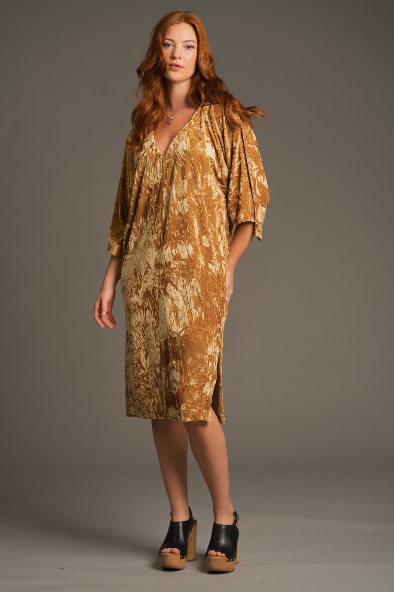 Full-length shot of Rumours midi dress showing deep V neckline and flowing silhouette