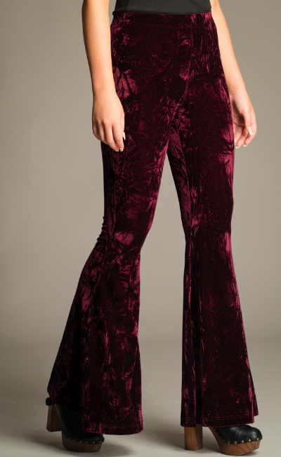 Close-up front view of the Hendrix Merlot Crushed Velvet Flares showing high-rise fit and velvet texture.