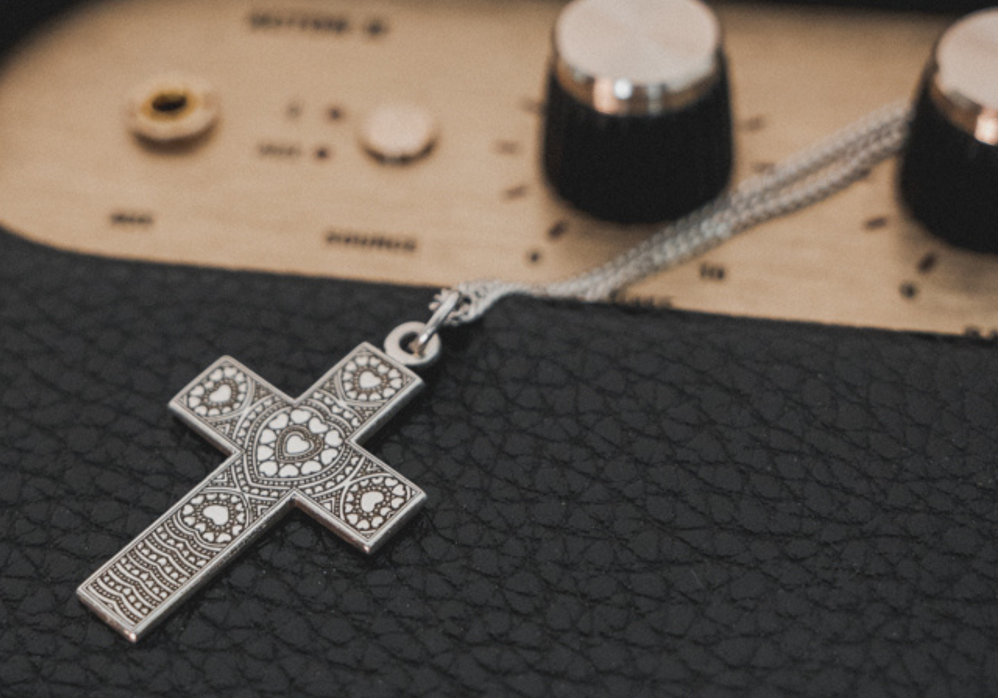 Sterling Silver Cross Pendant Necklace on Marshall Amp