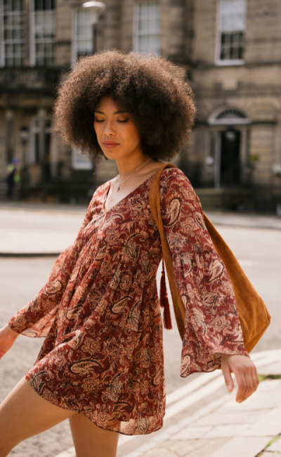 Model Grace in Edinburgh street style shot wearing Gold dust Paisley Smock Dress featuring Olsen Tan suede slouchy bag.