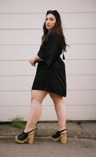 Model Taylor wearing in street style shot wearing the Sweet Emotion Black Batwing Dress