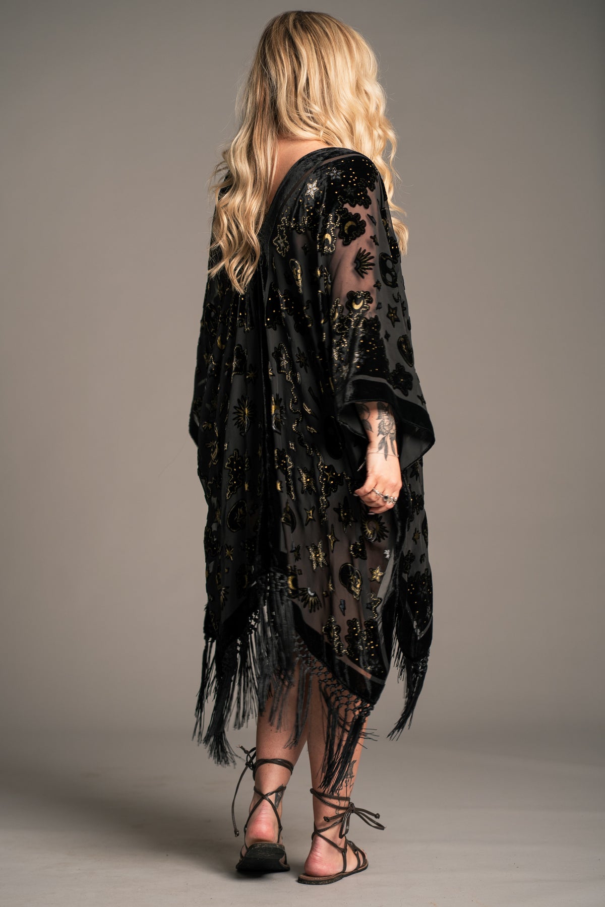 Little Lies Suzi Skull black devore kimono with skull motif, sheer fabric and fringe trim, on‑model back view