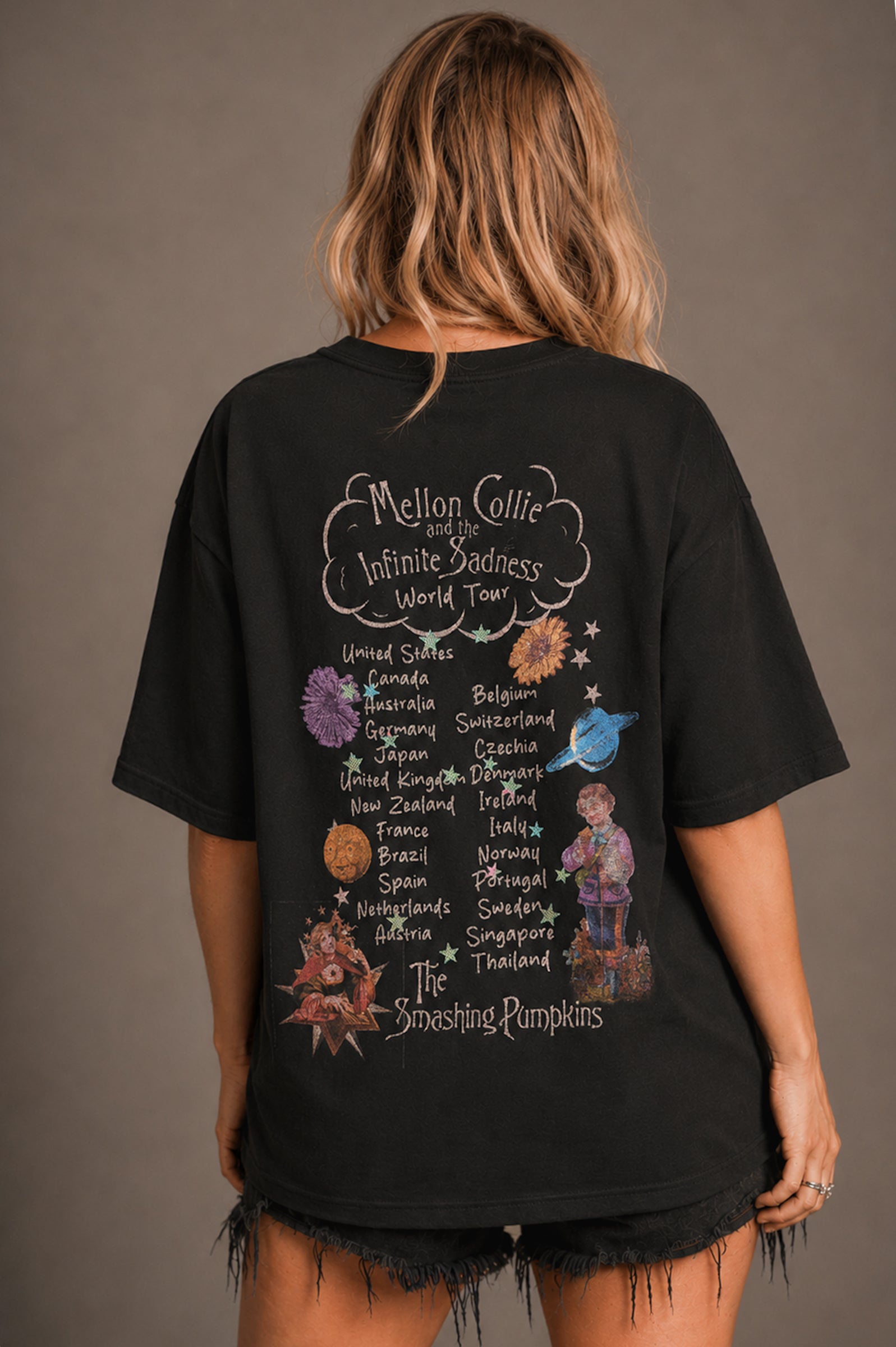 Little Lies Smashing Pumpkins t-shirt in black featuring Mellon Collie and the Infinite Sadness world tour print on back