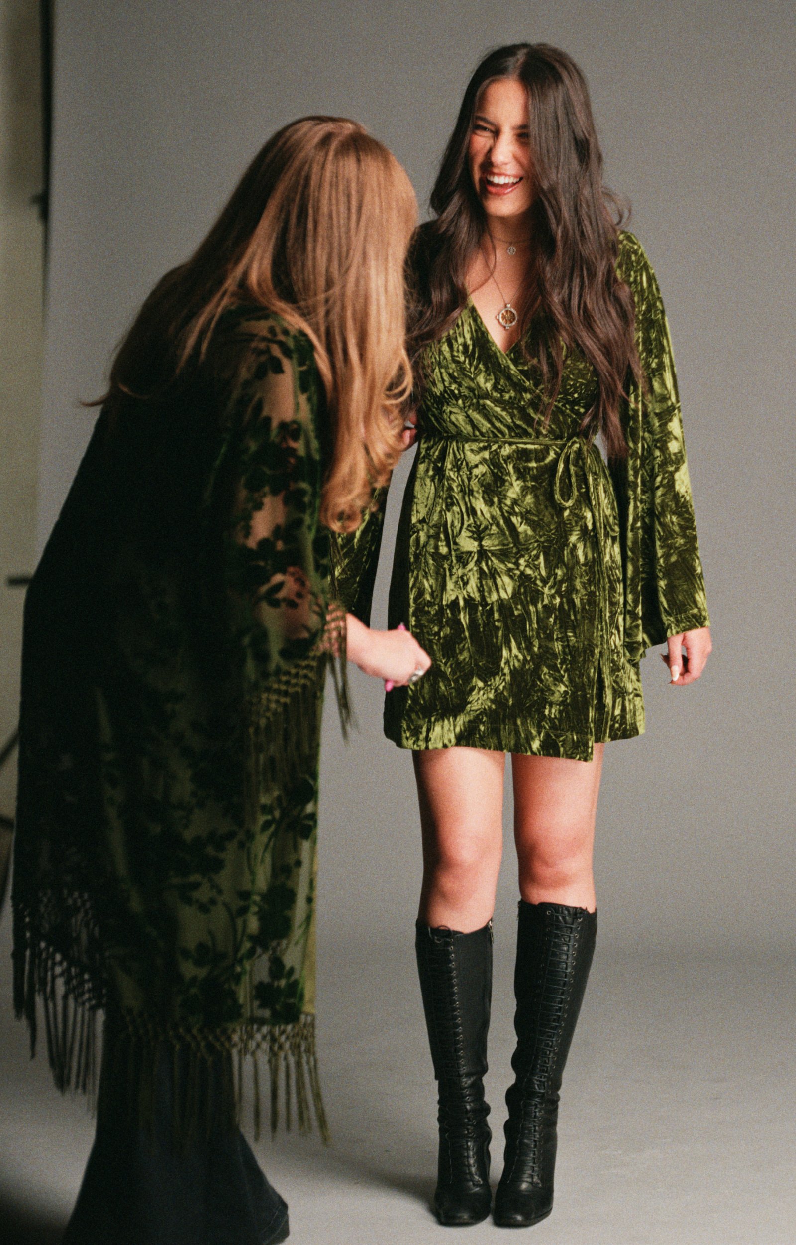 Jaded Olive Crushed Velvet Wrap Dress by Little Lies featured during an autumn campaign photoshoot with a flattering wrap silhouette and luxe velvet texture