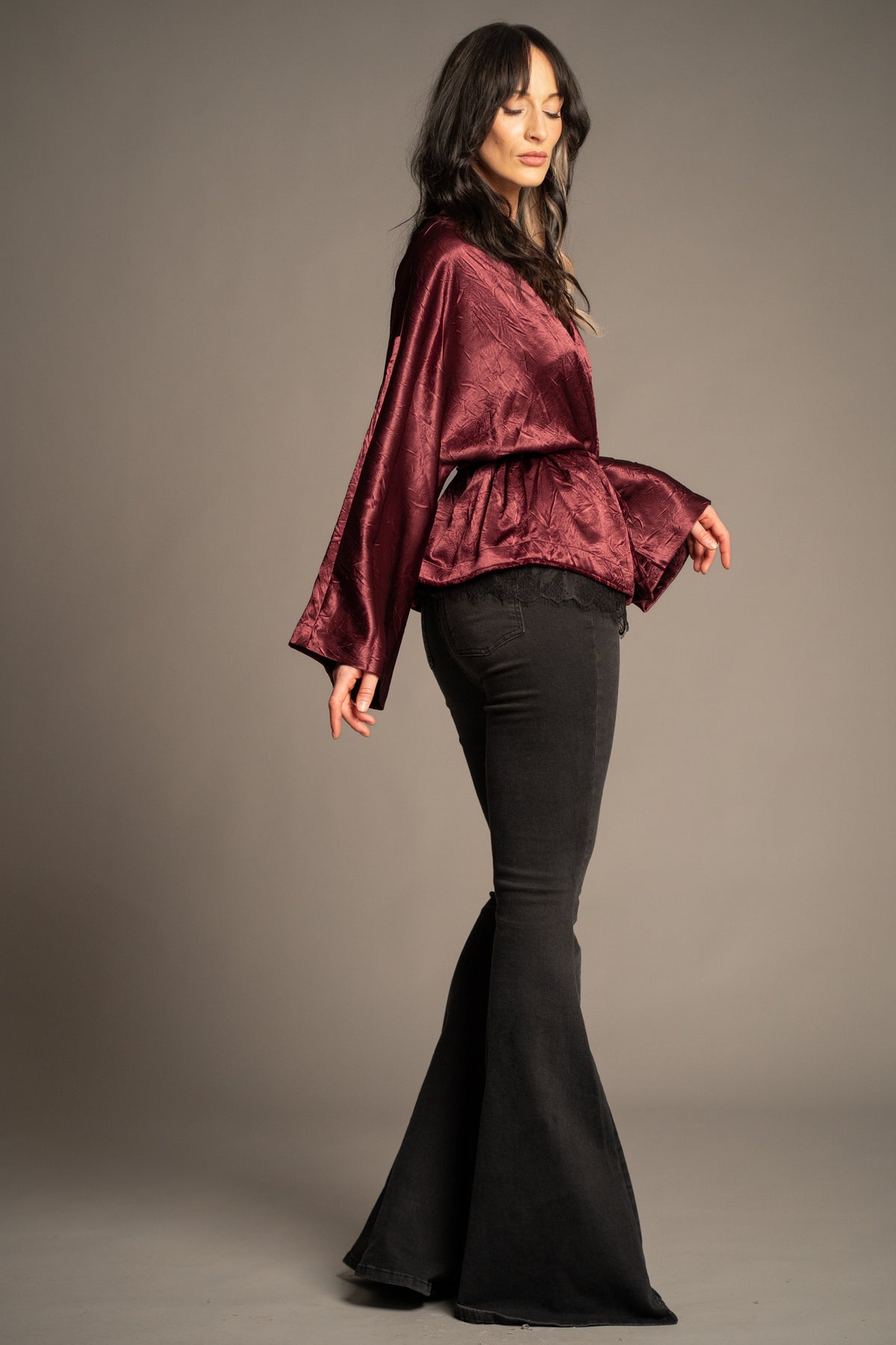 Celeste wine kimono top side view featuring draped kimono sleeves, tie waist detail and flowing silhouette