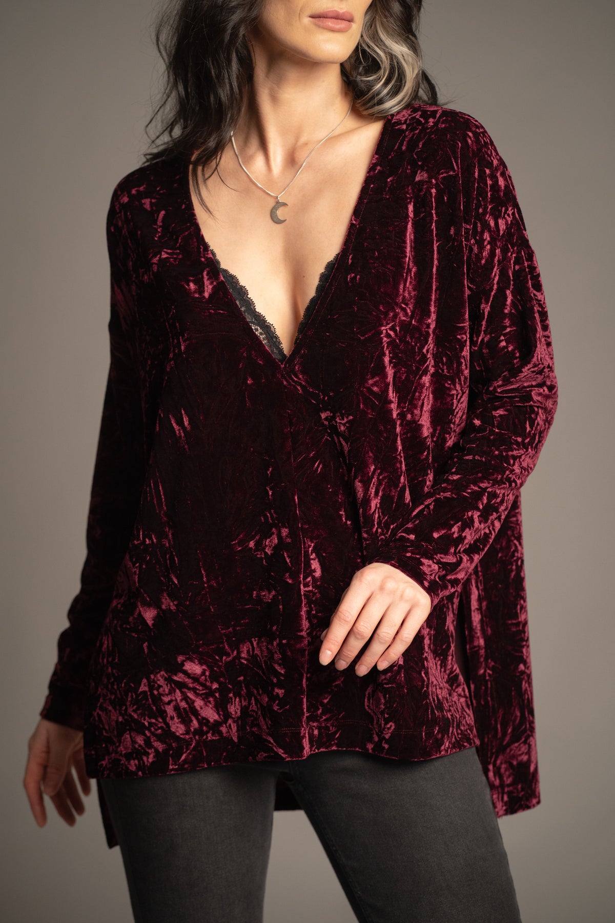 Close-up of Dylan Merlot crushed velvet tee showcasing soft textured velvet fabric, deep V-neckline and relaxed silhouette