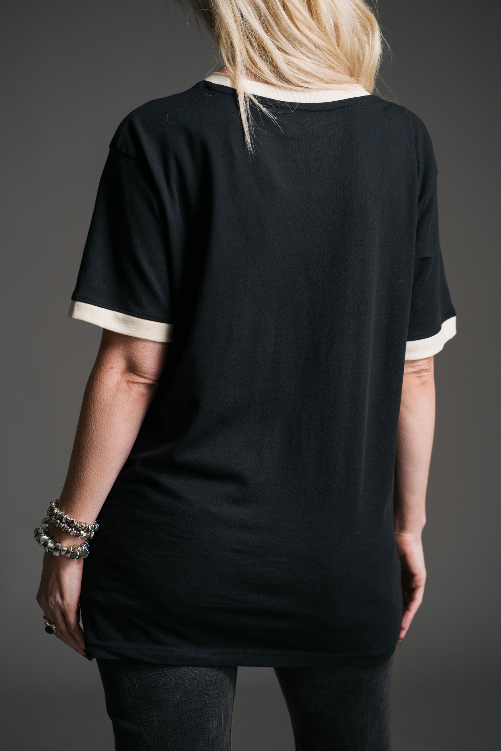 Back view of the Eagles of Death Metal Ringer Band Tee featuring a relaxed silhouette, short sleeves and contrast ringer trim