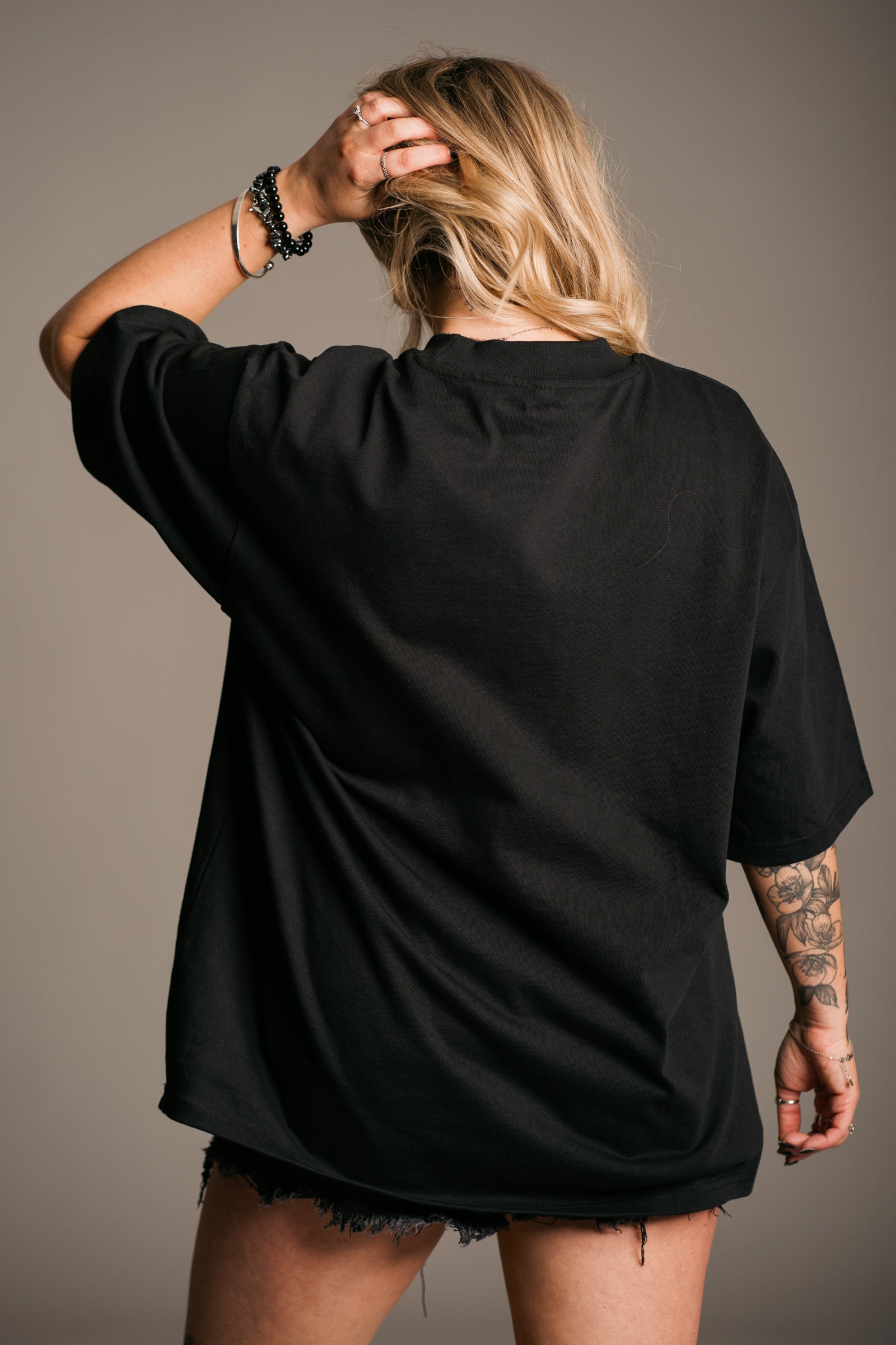 Fleetwood Mac Floral Oversize Band Tee styled with denim shorts for summer from Little Lies