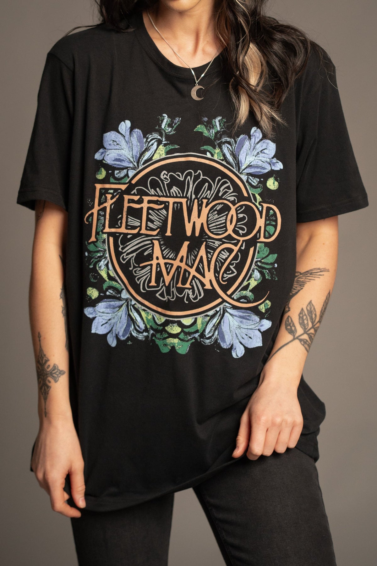 Close-up of colourful floral logo artwork on Fleetwood Mac Wildflower T-Shirt