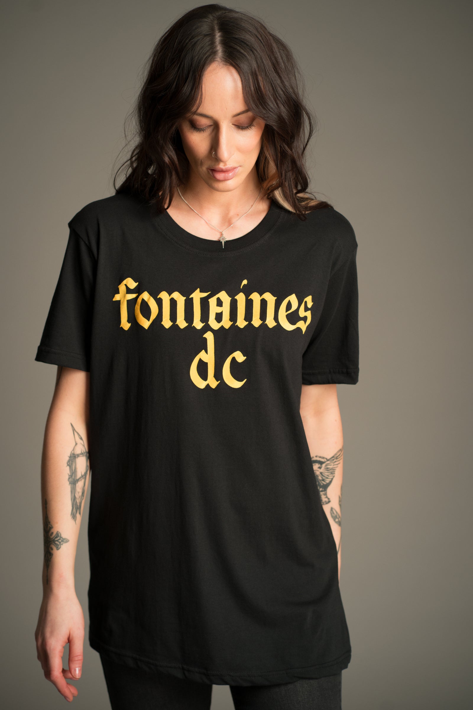 Full outfit Fontaines D.C. gothic logo T-shirt styled with denim