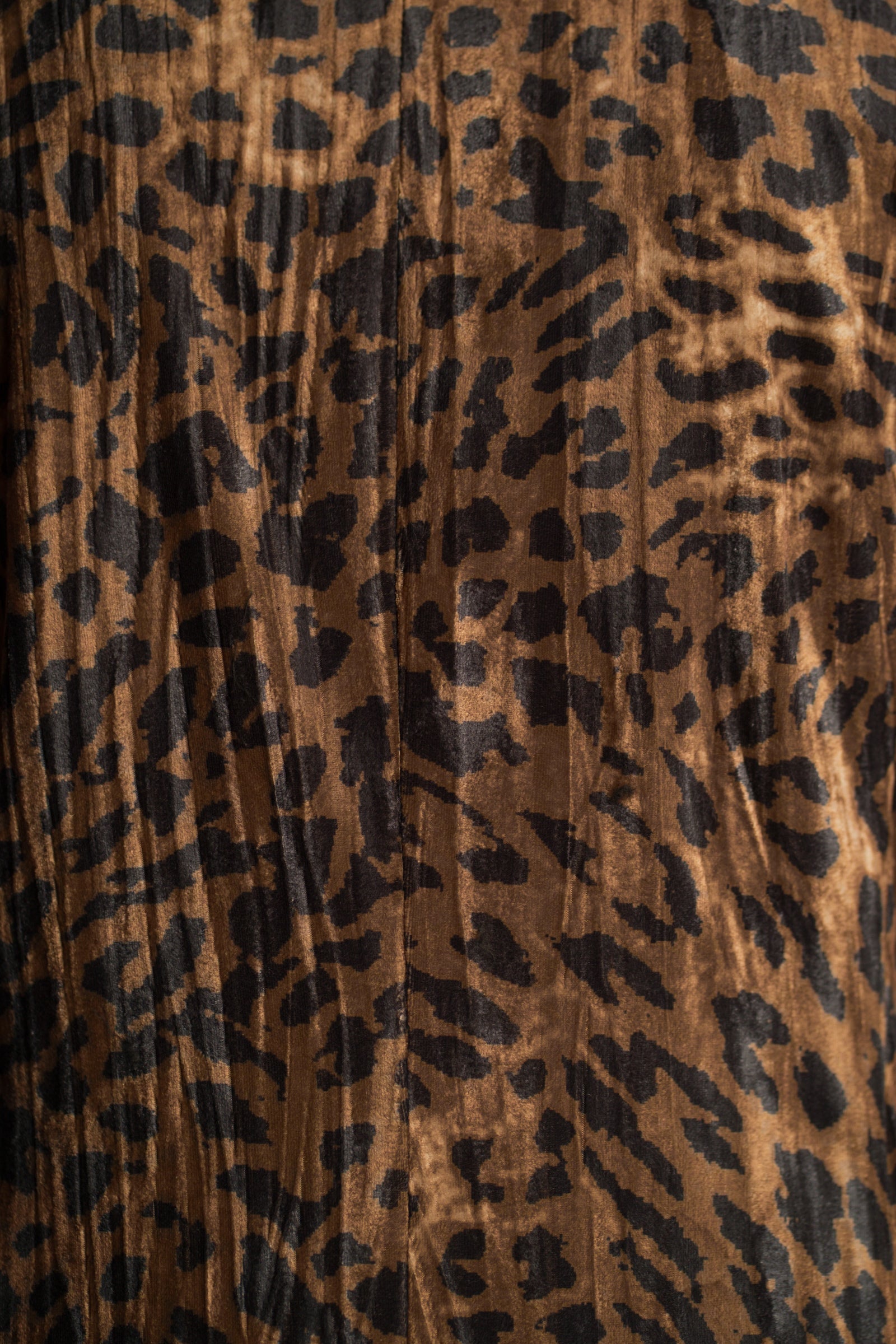 Close-up of the leopard print crushed velvet fabric on the Jagger Leopard Velvet Duster Coat.