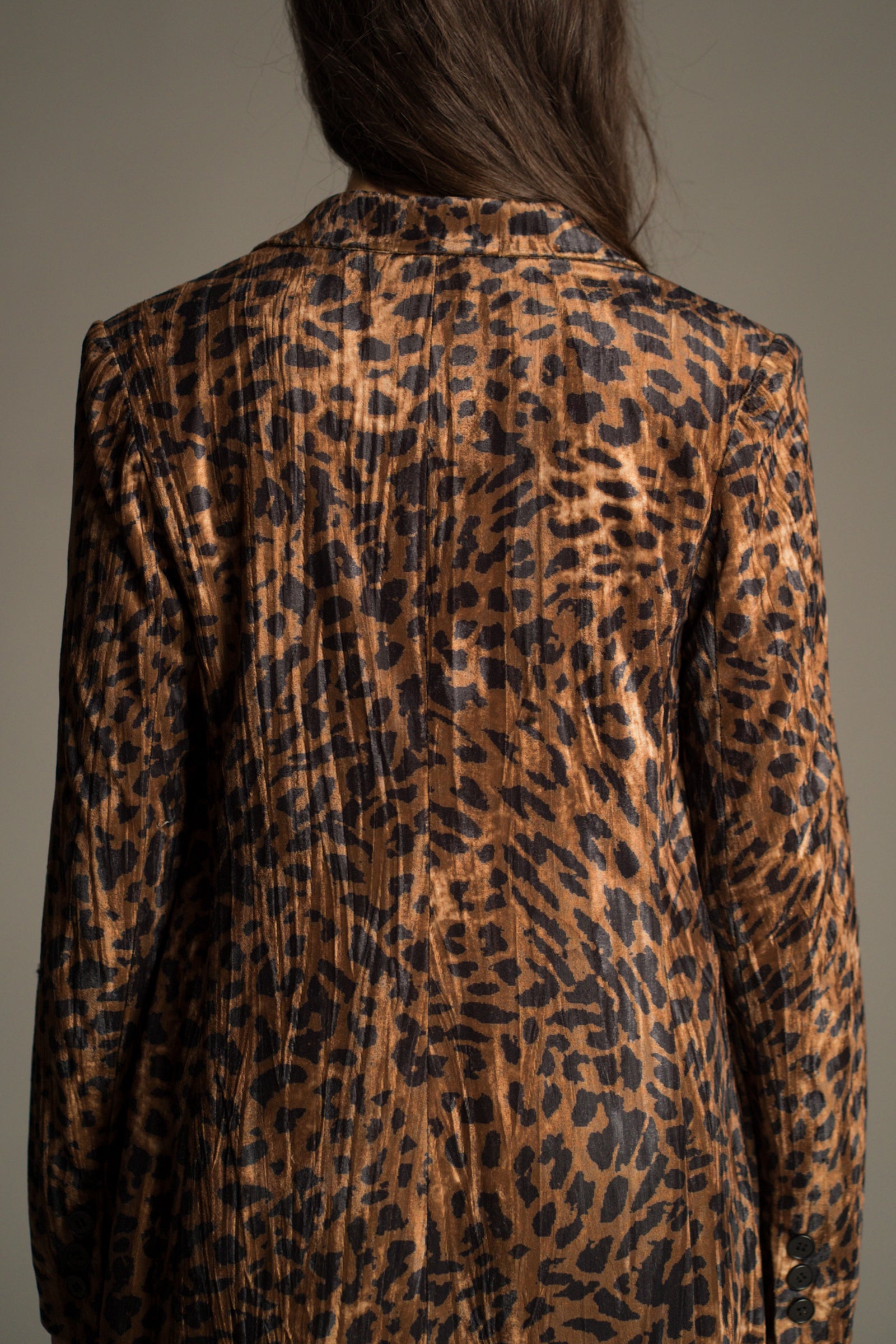 Back view of the top of the Jagger Leopard Velvet Duster Coat showing collar and fabric details.