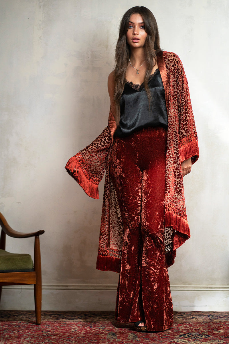 Carla wears Hendrix Rust Crushed Velvet Flares with the Little Lies Heartbreaker Kimono for a boho rock look