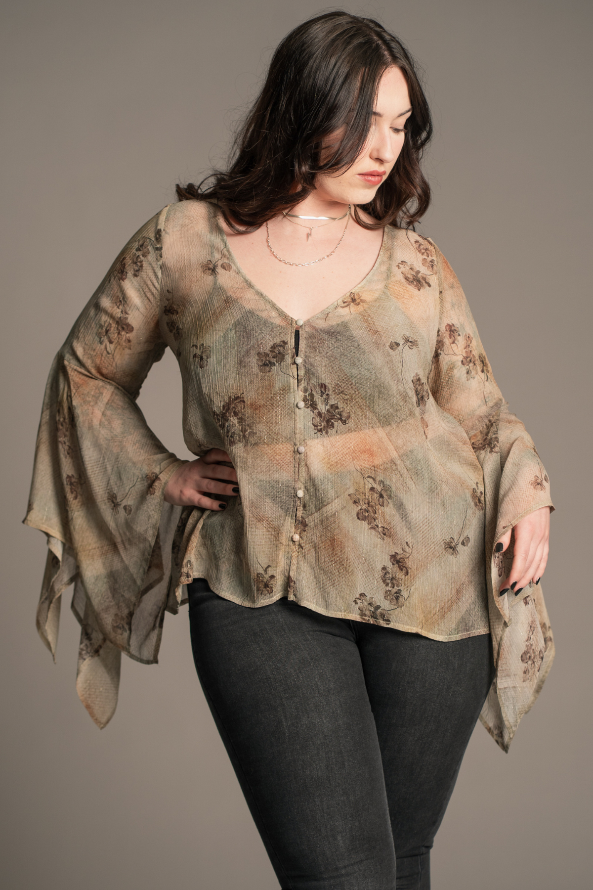 Little Lies Karma Sage Blouse with flared sleeves styled with Hendrix Denim Flares