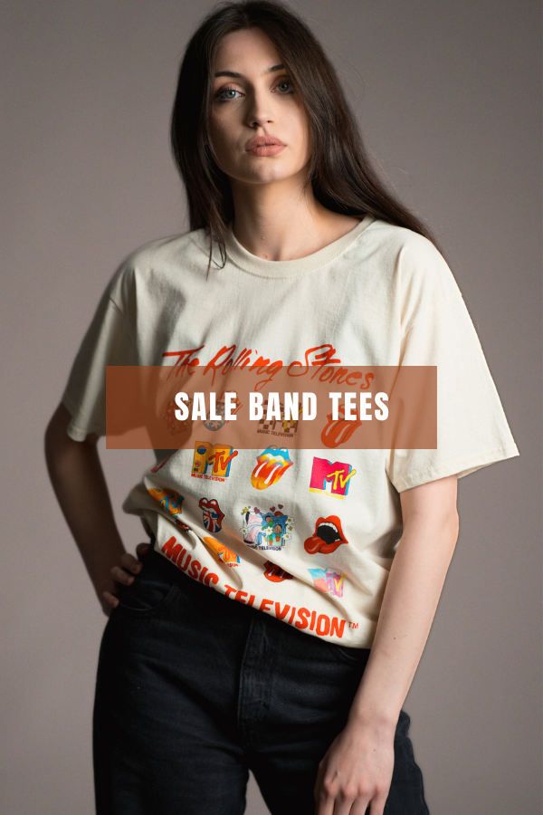Shop sale Band Tees at Little Lies with up to 60% off. Model wearing The Rolling Stones MTV Logo Band Tee