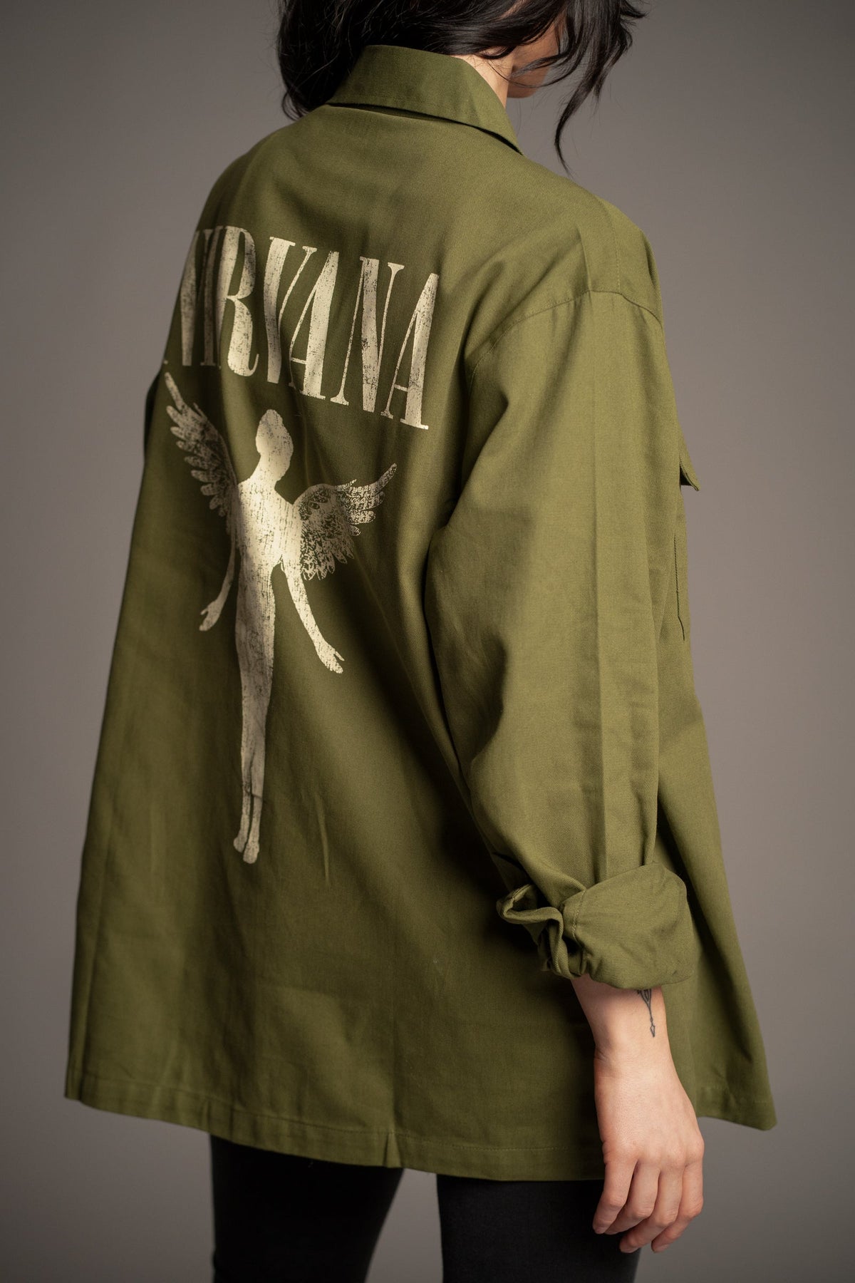 Back detail of Victoria wearing the Nirvana In Utero khaki overshirt