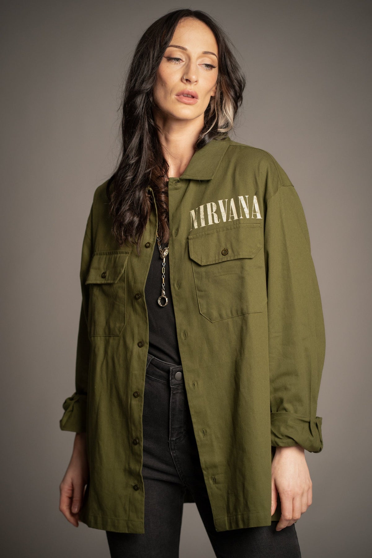 Front detail of the Nirvana In Utero khaki overshirt with chest lettering and utility pockets
