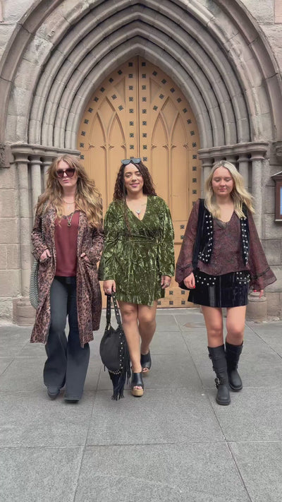 Little Lies autumn collection street style video featuring three models walking as outfits seamlessly transform with each step, showcasing velvet, paisley, devore and denim styles