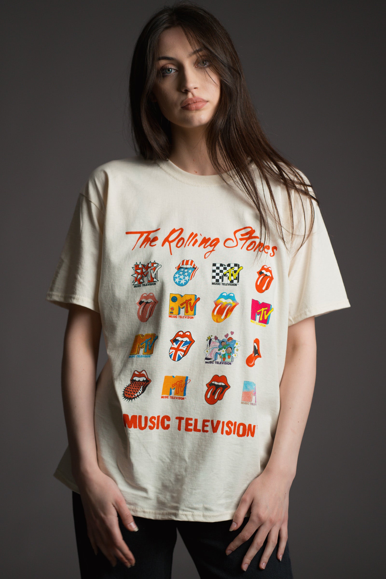 Andie wears unisex cream Rolling Stones Music Television graphic t‑shirt by Little Lies featuring multicoloured MTV and tongue logo prints