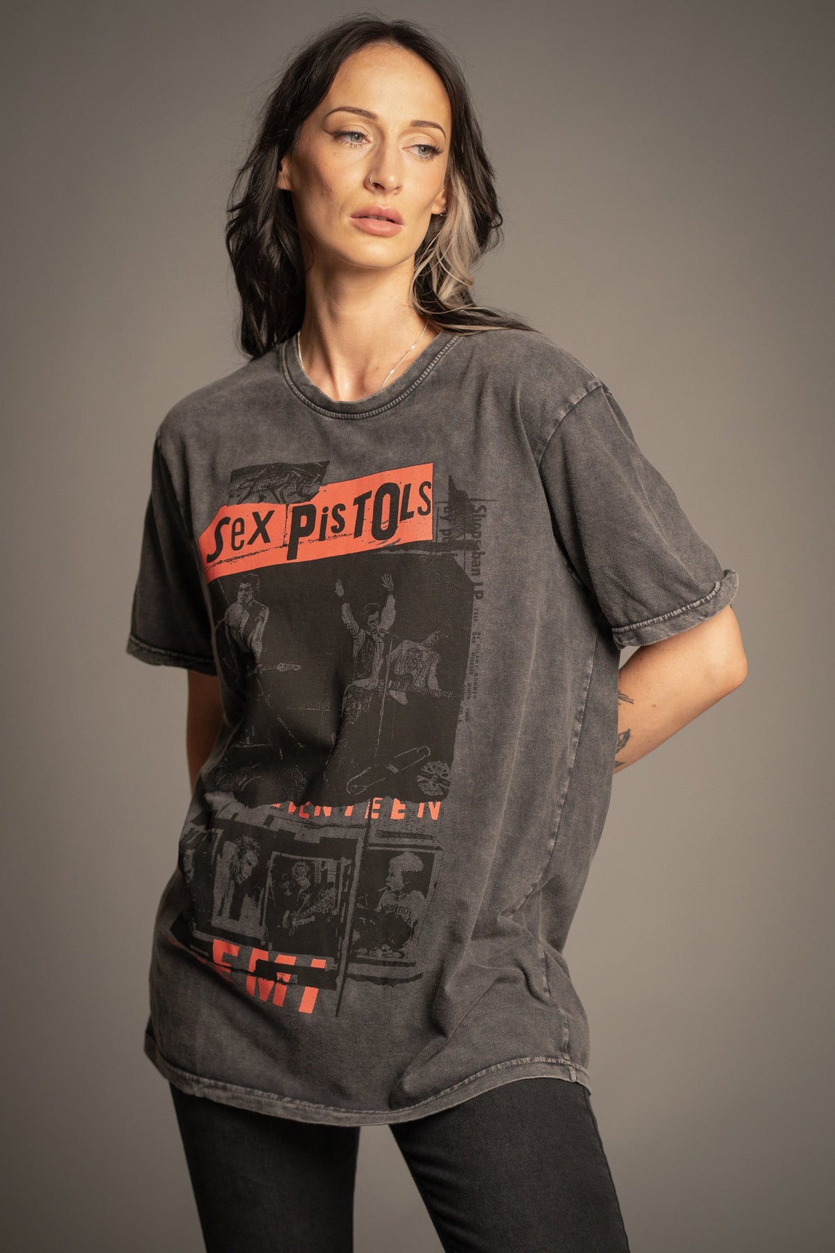 Close-up of Victoria wearing the Sex Pistols band T-shirt with distressed punk graphic